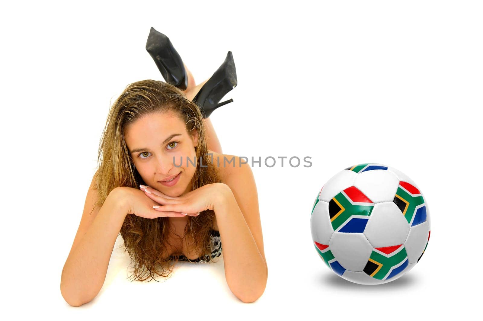 Sexy young girl in bikini with soccer ball isolated in white