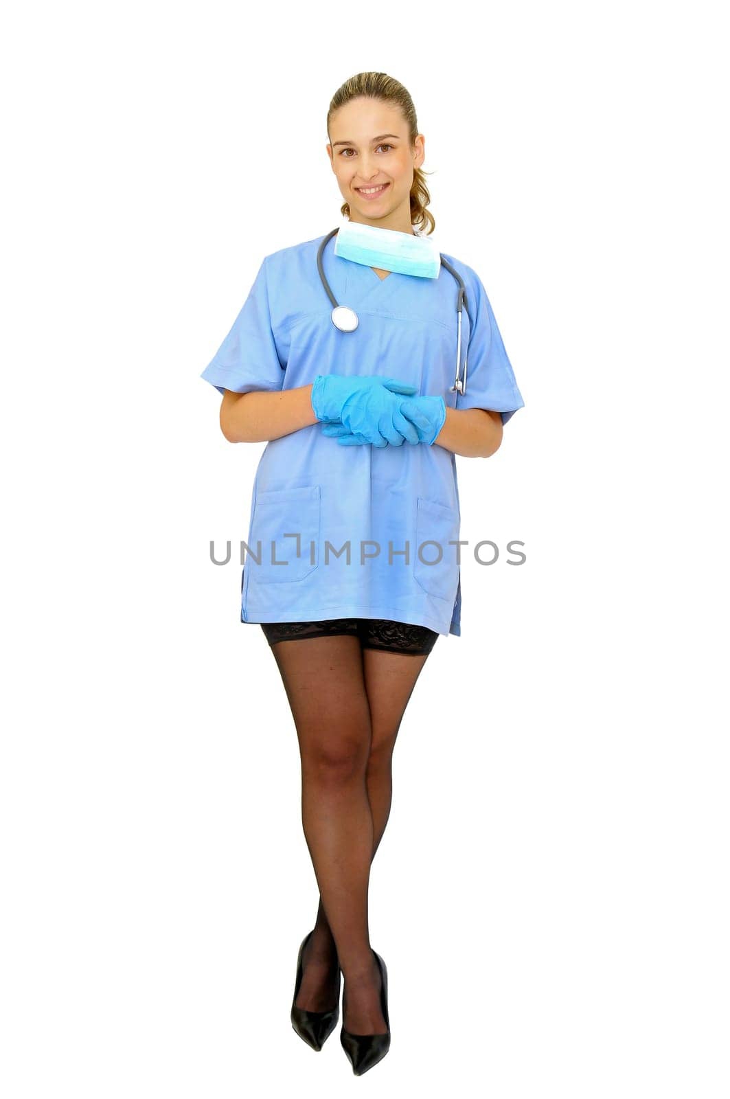Sexy young doctor posing against a white background