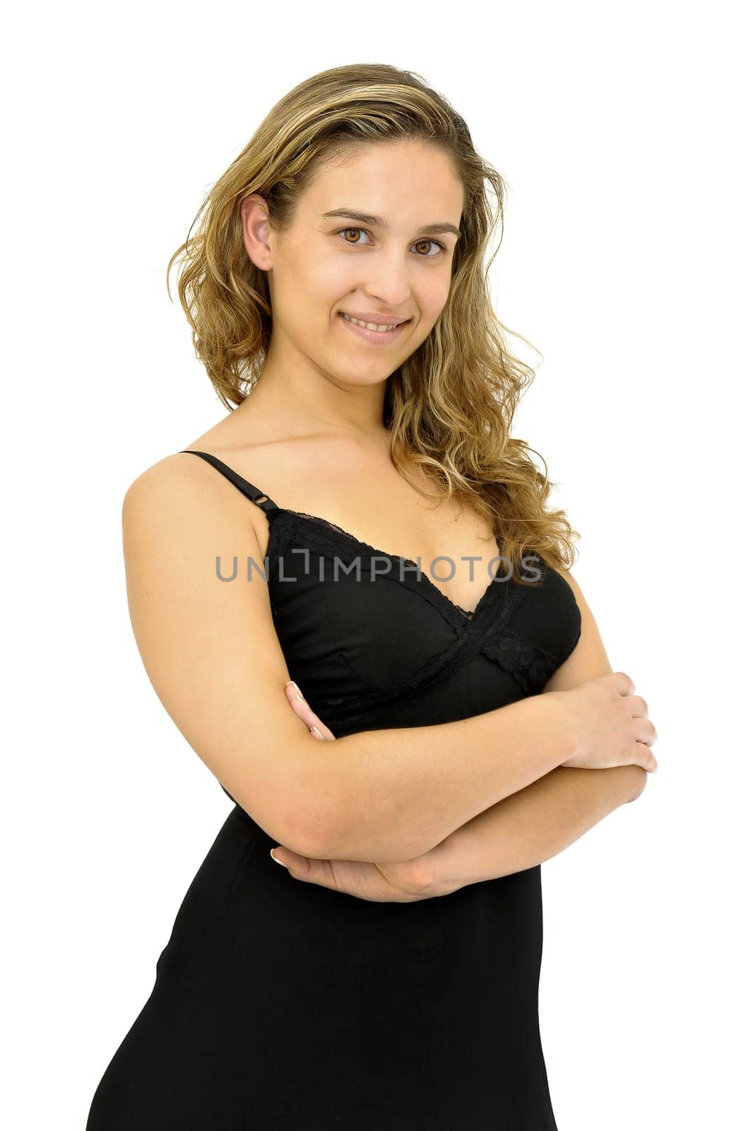 Beautiful young woman posing with a black dress isolated in white