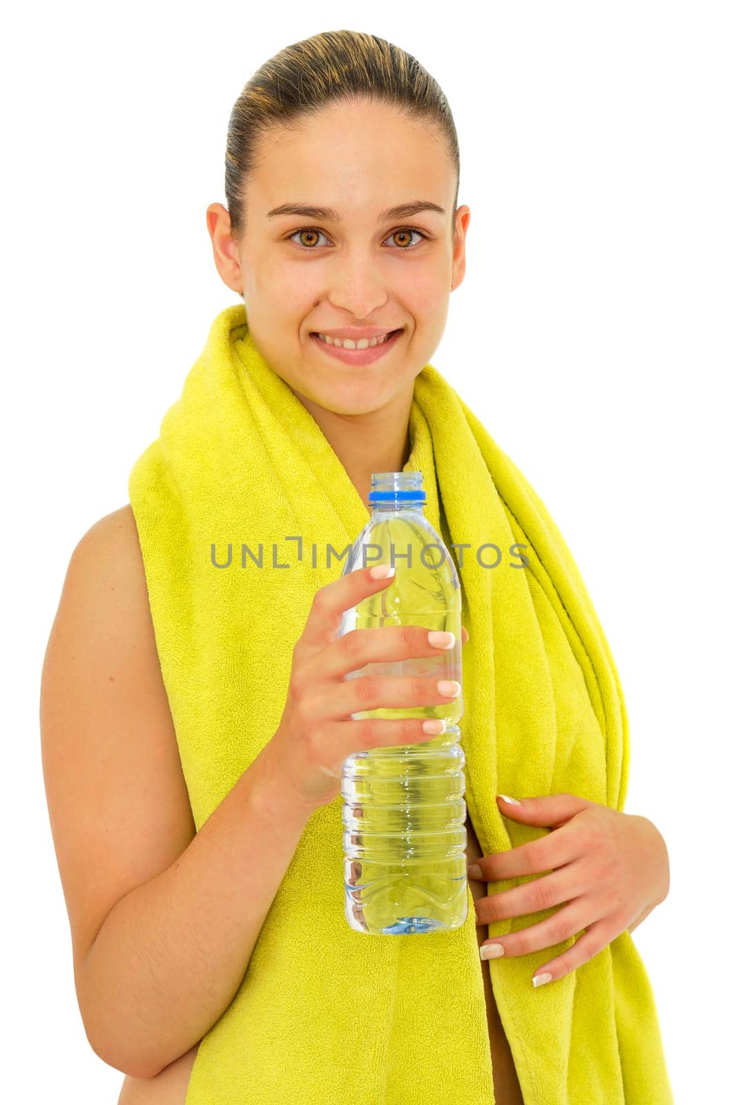 Sexy young girl with towel and water bottle isolated in white