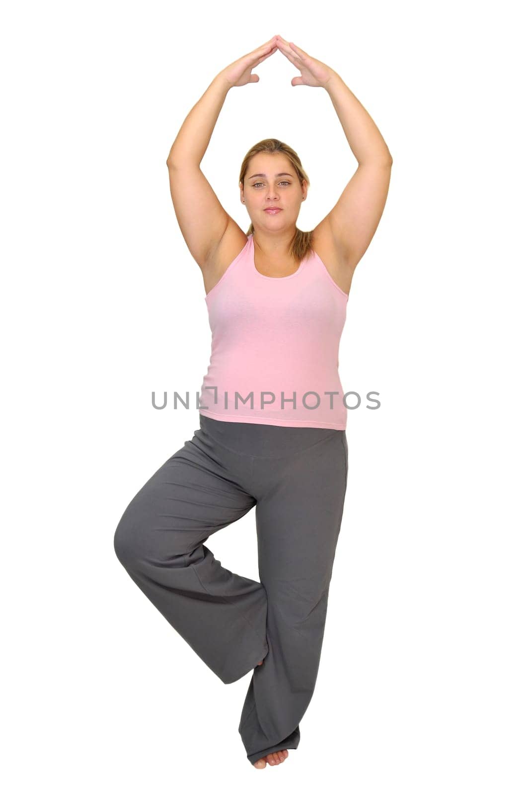 Pregnant woman making exercises isolated in white