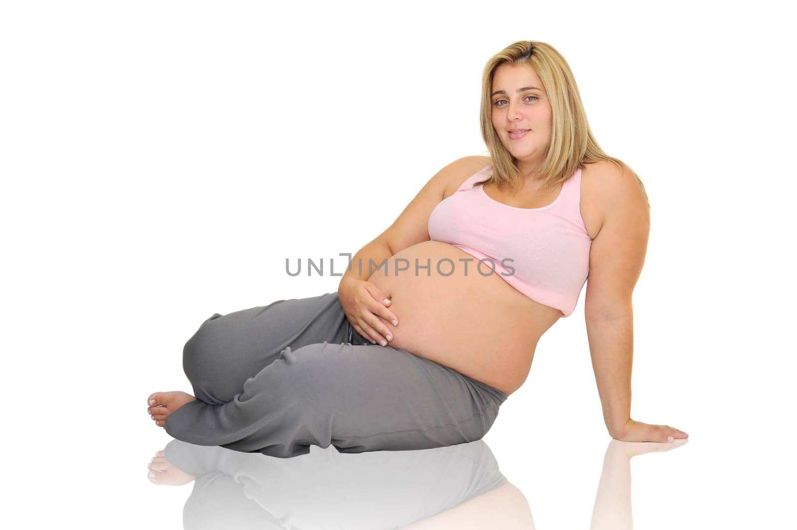 Pregnant woman isolated in white