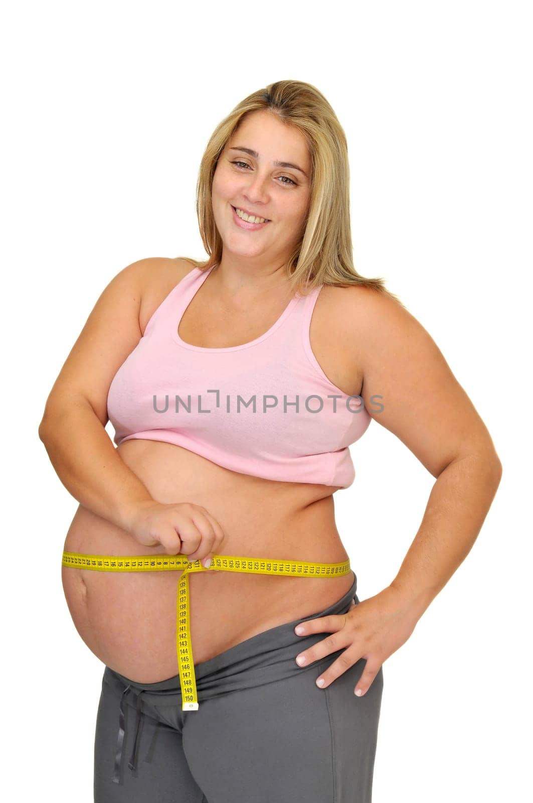 Pregnant woman with measuring tape isolated in white