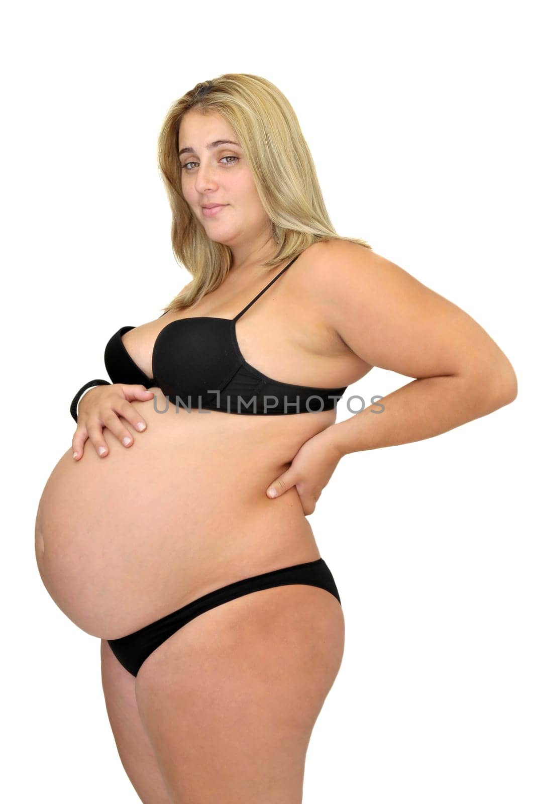 Pregnant woman isolated in white