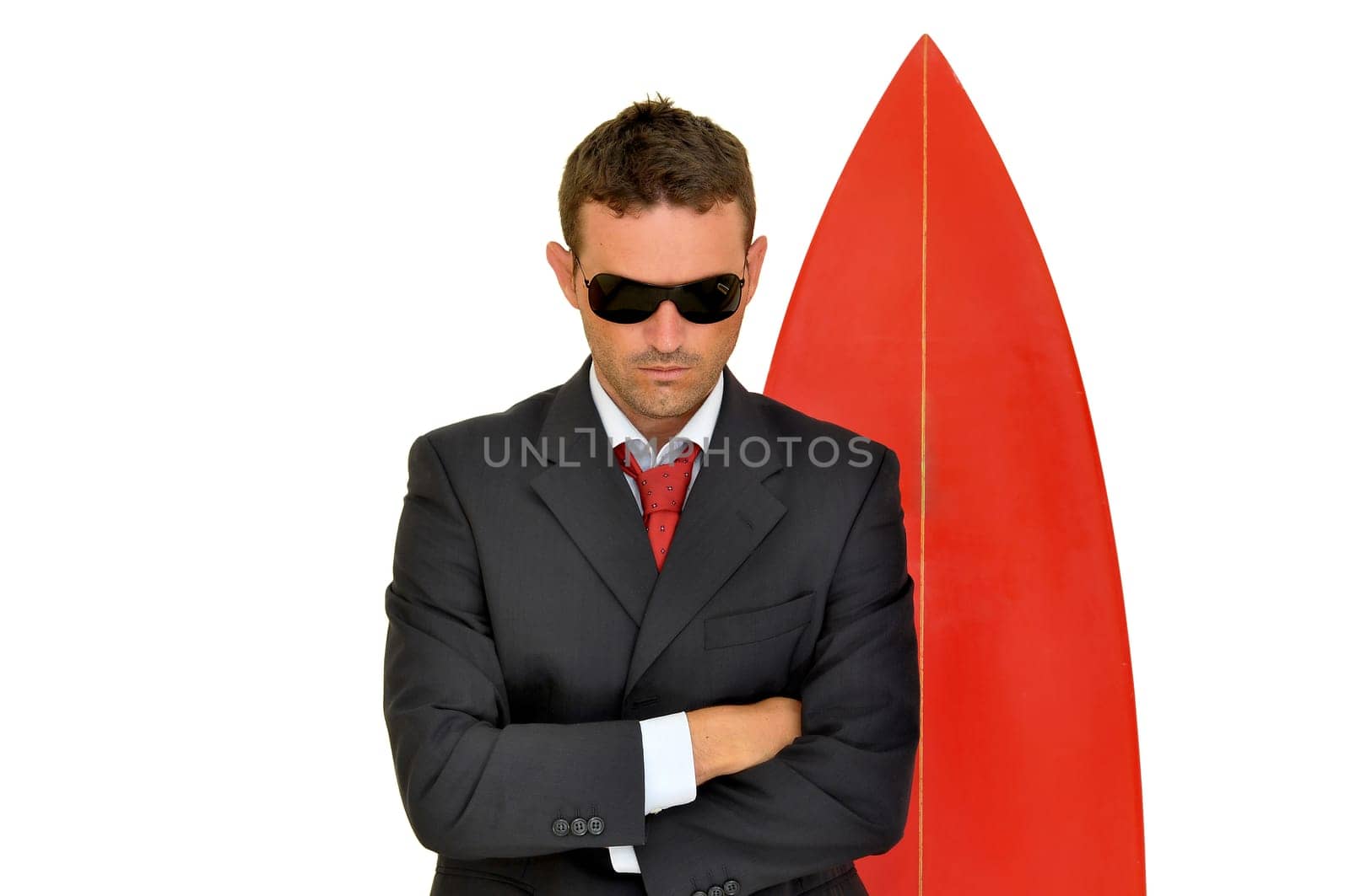 Young businessman with surf board