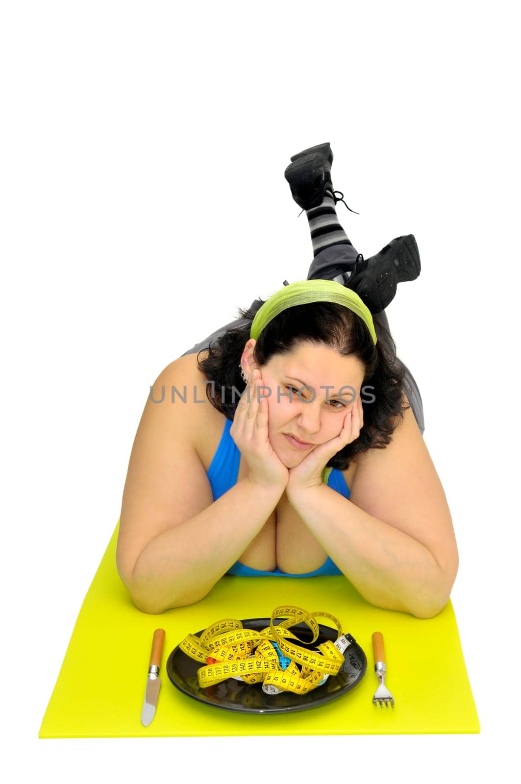 Large girl eating a measuring tape