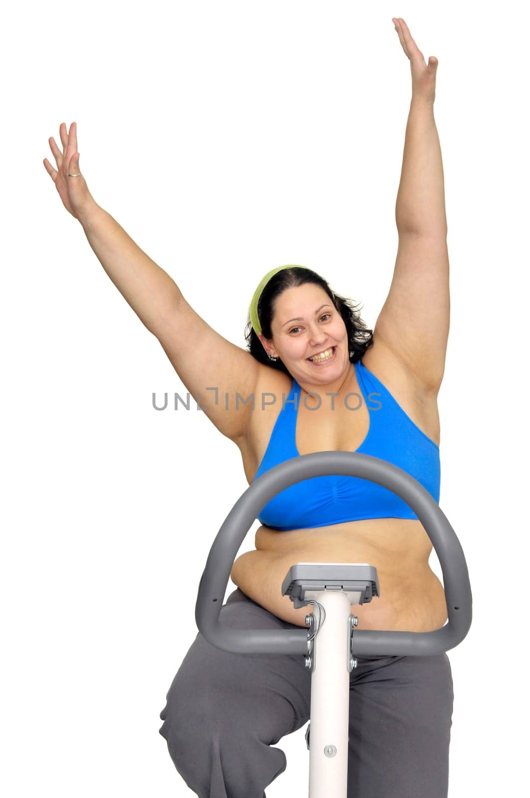 Large girl exercising isolated in white