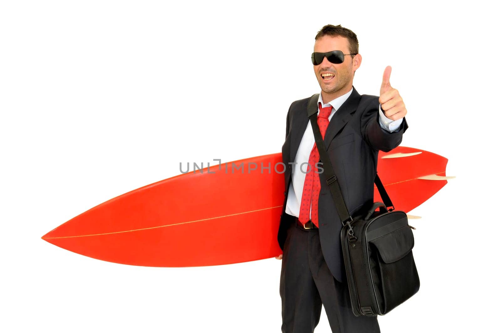 Young businessman with surf board