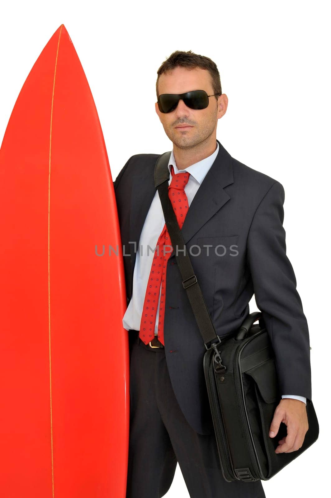 Young businessman with surf board