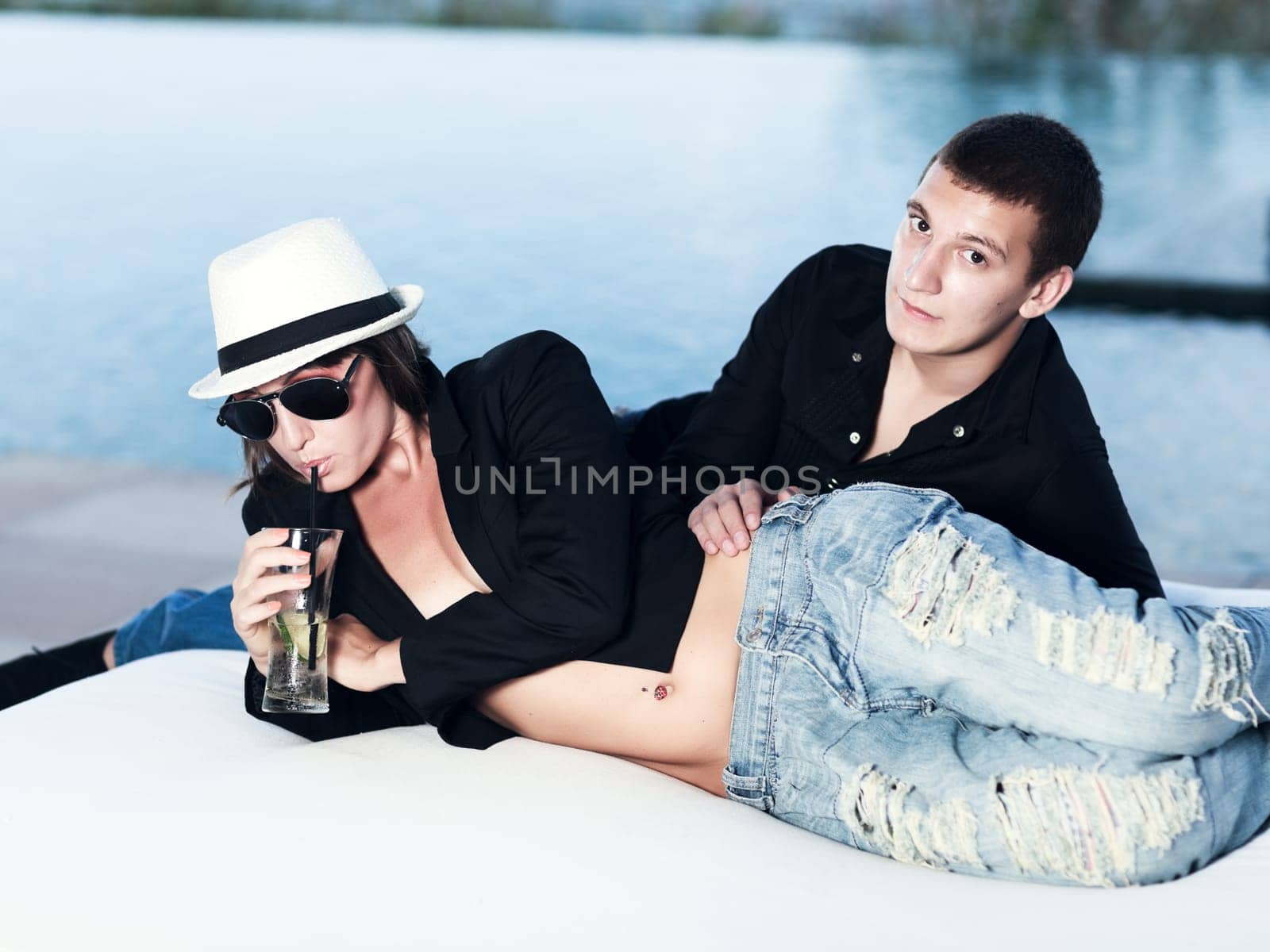Young couple. Sea on the background