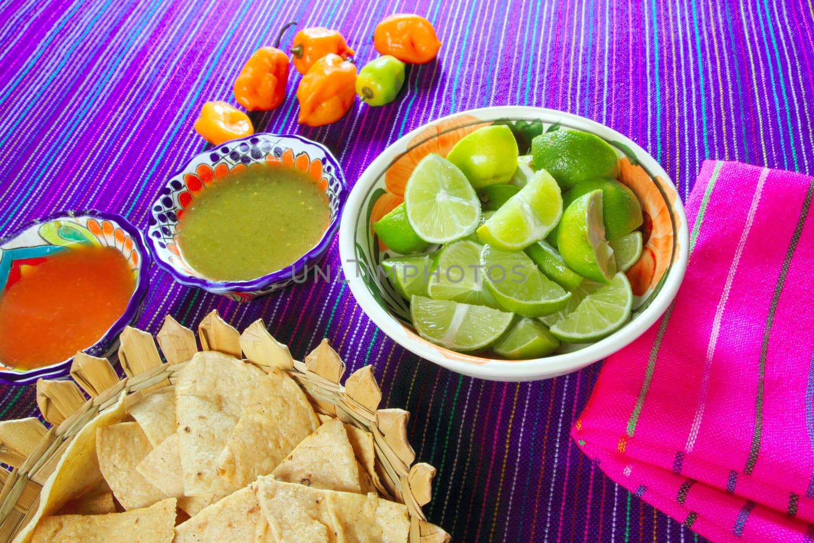 Mexican food varied chili sauces nachos lemon Mexico flavor