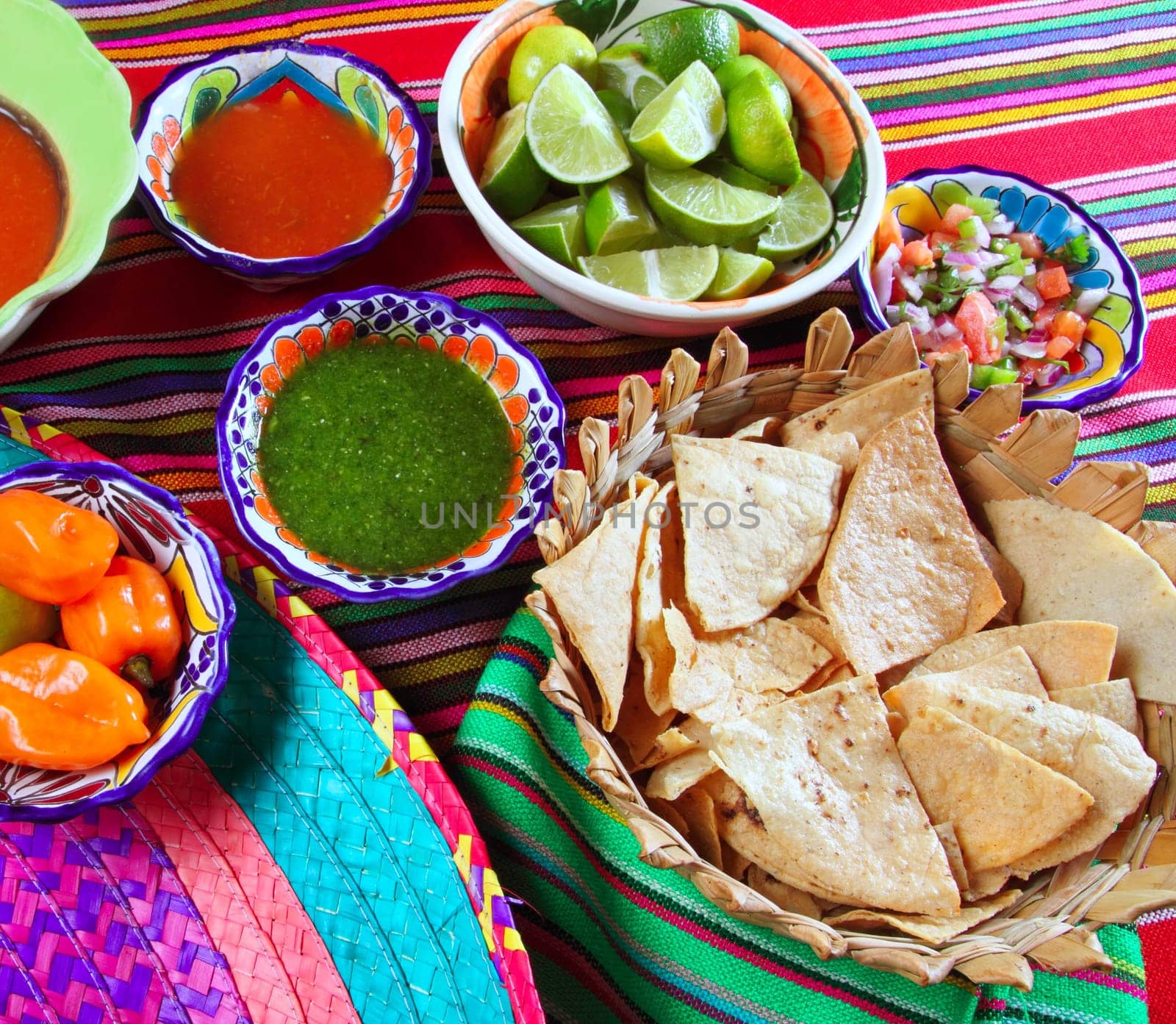 Mexican food varied chili sauces nachos lemon Mexico flavor