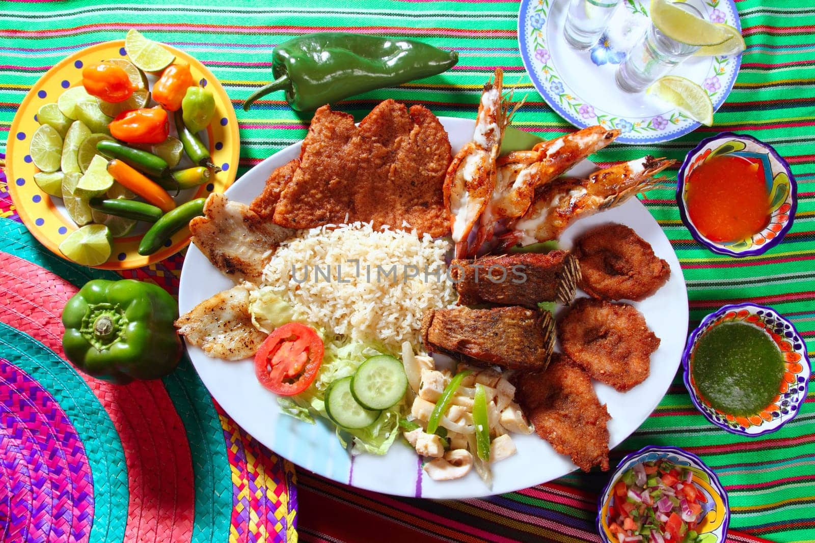 assorted grilled seafood in Mexico tequila chili hot sauces