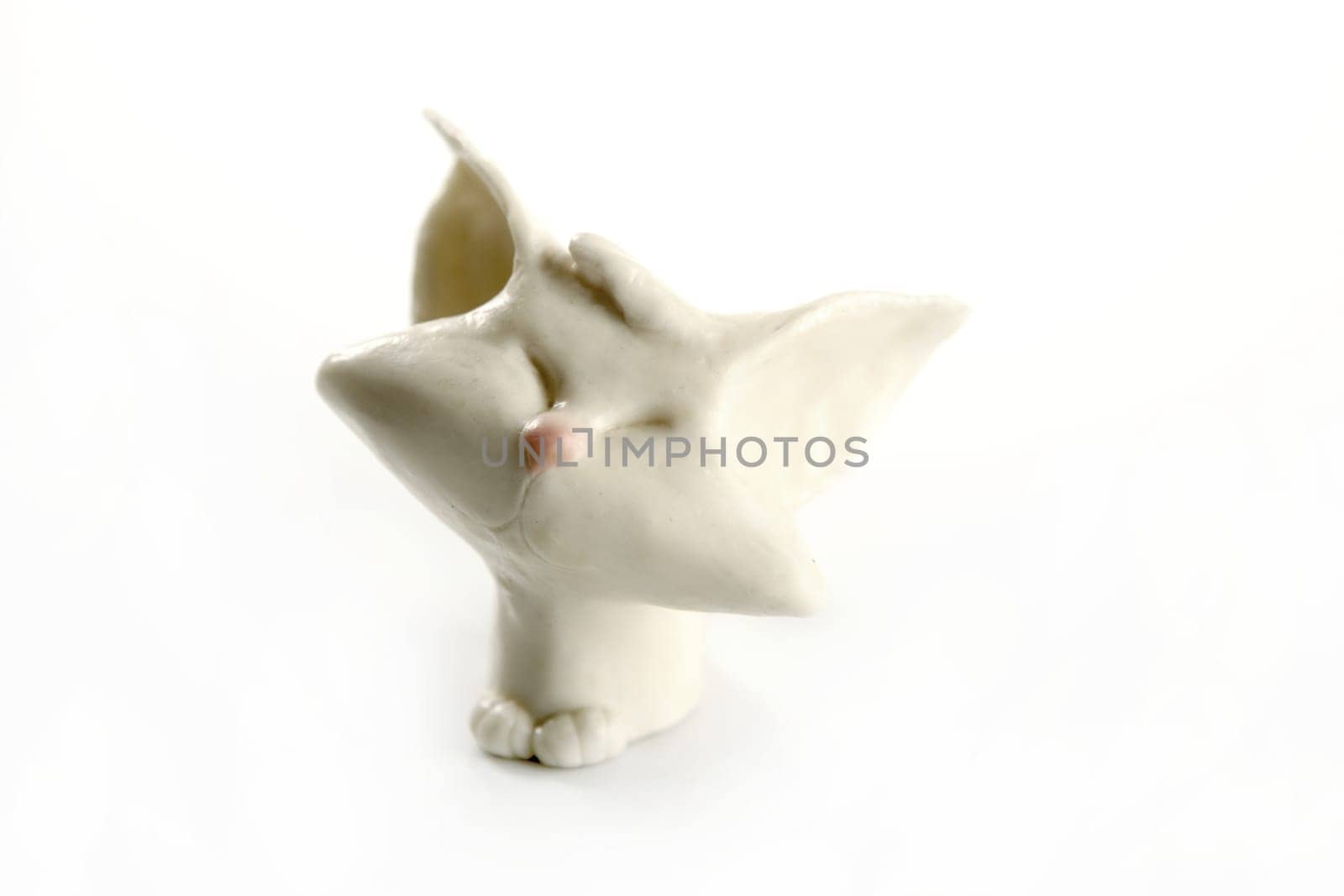 plasticine handmade cat isolated over white background