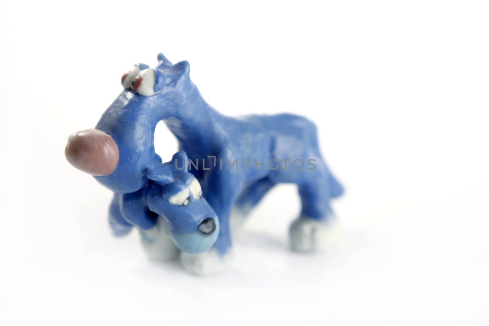 Plasticine funny handmade dog isolated on white background