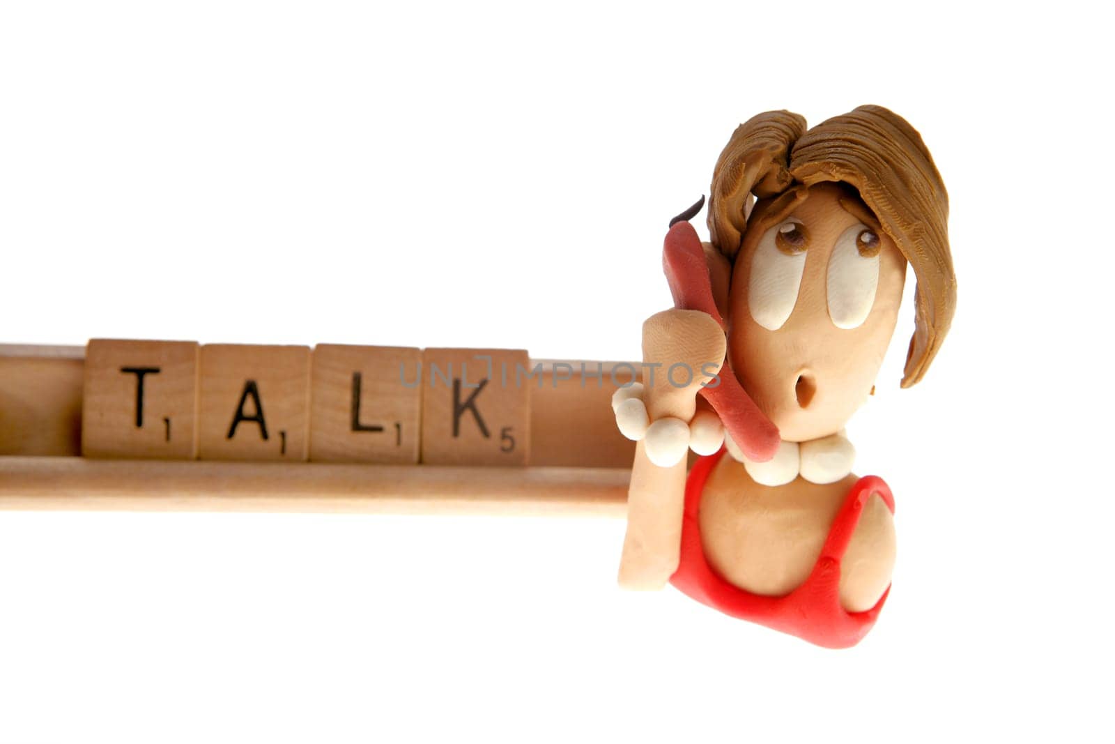 Alphabet game spelling: talk. Plasticine woman talking by phone