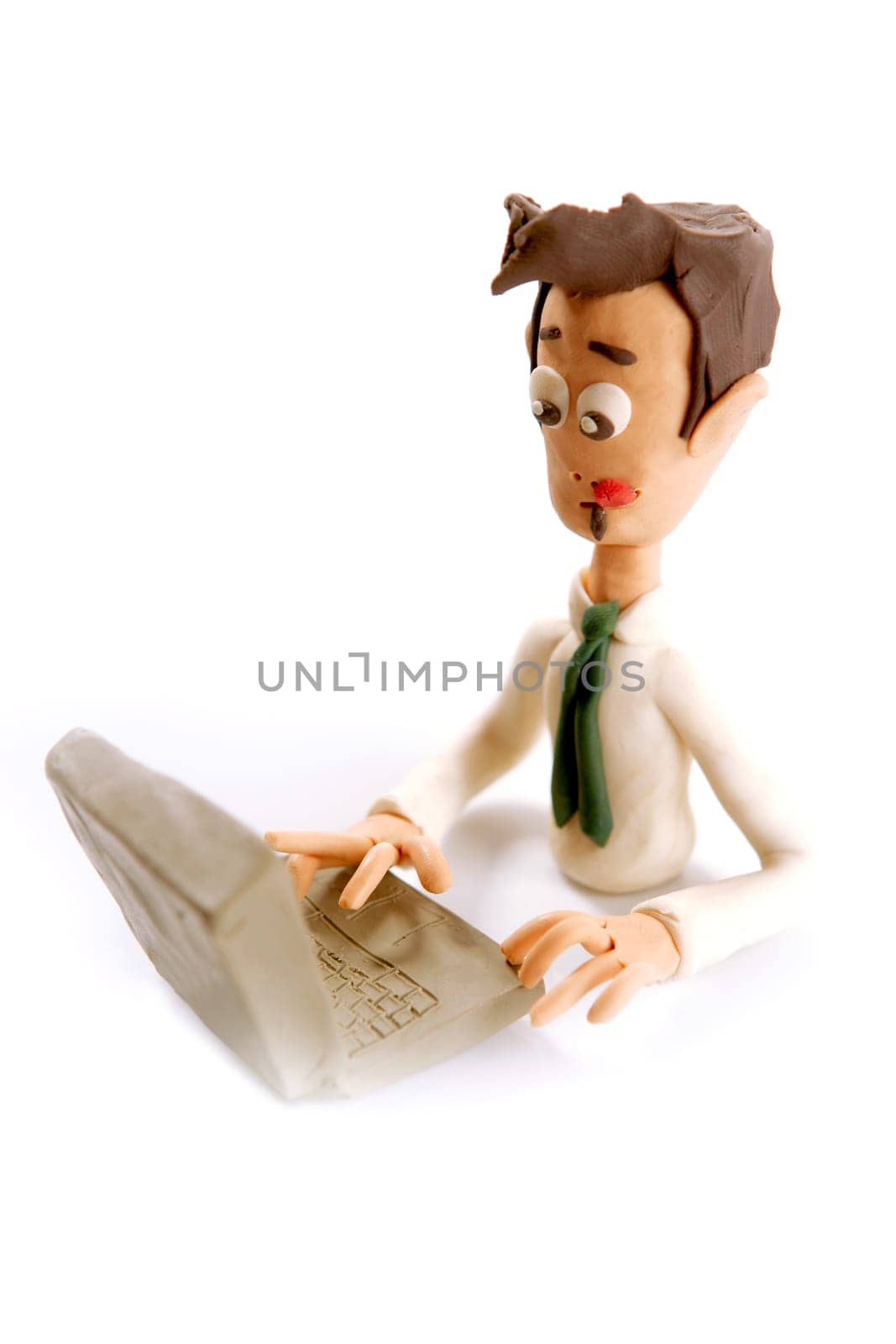 stressed plasticine handmade businessman with laptop isolated on white