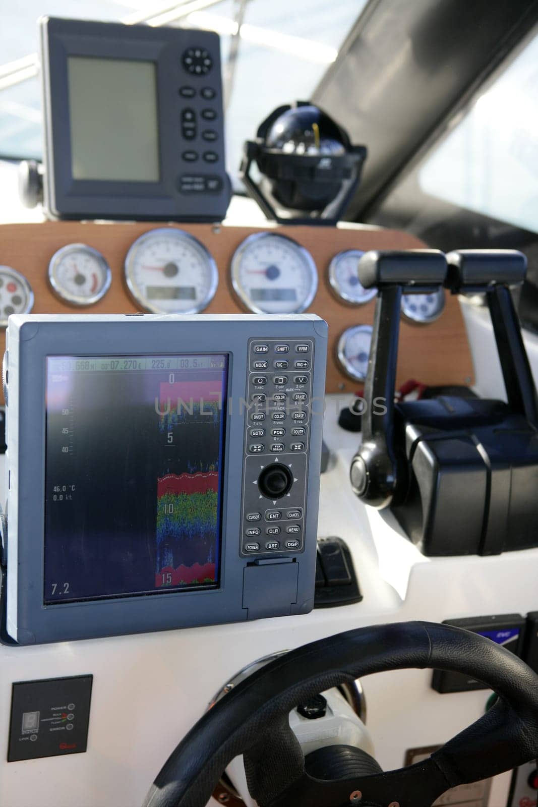 Boat control bridge, plotter, fishfinder, radar, power, compass, interior white