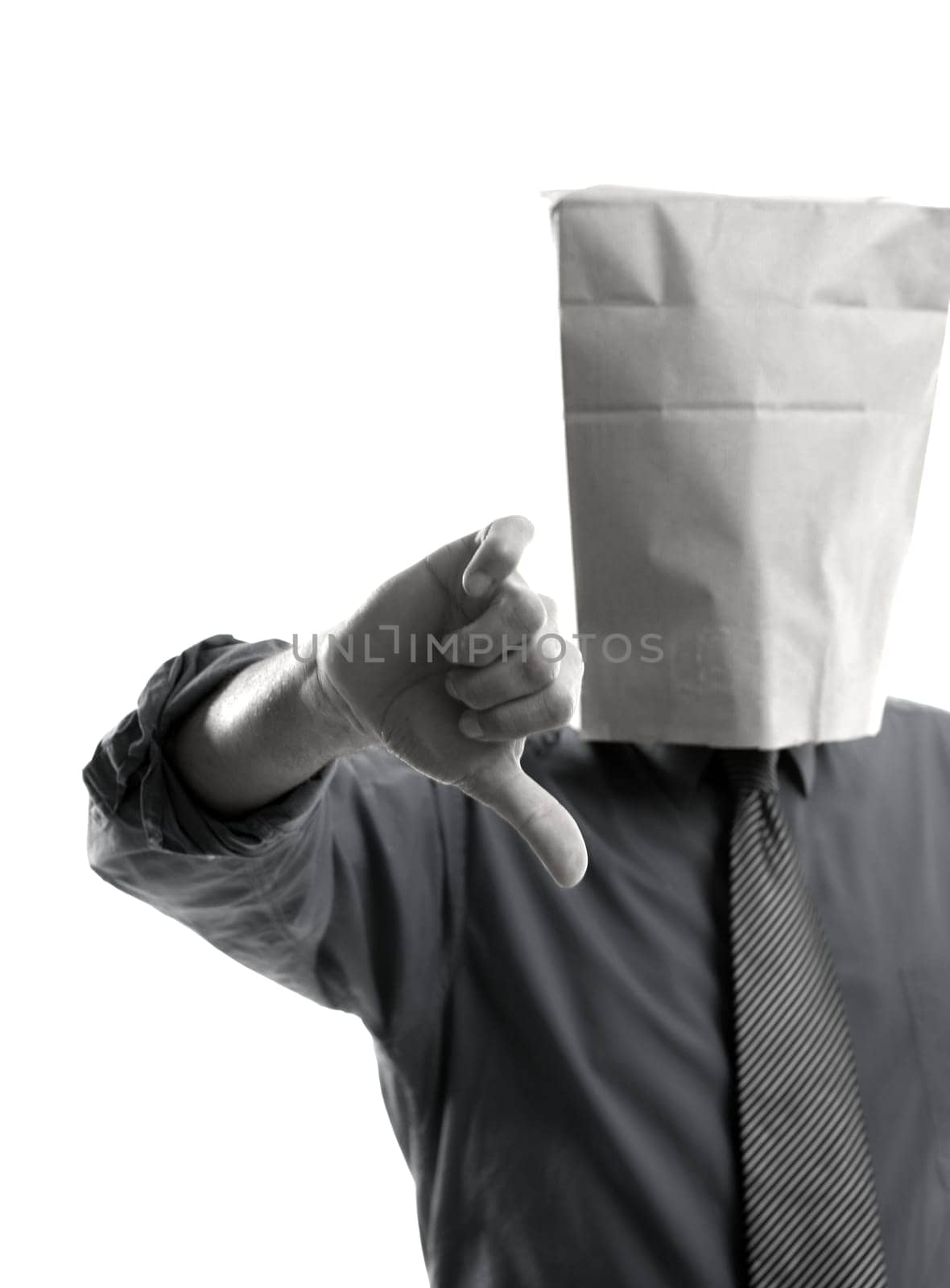Businessman with paper bag in head