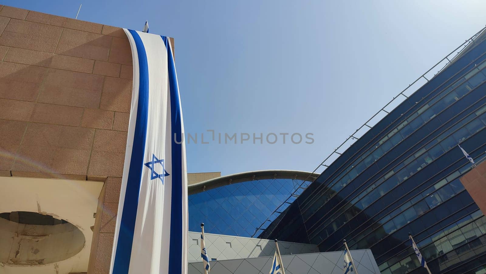 October 23, 2023 Beer Sheva Negev Israel, Ministry of Interior, Israeli flag modern office building, urban architecture. High quality photo