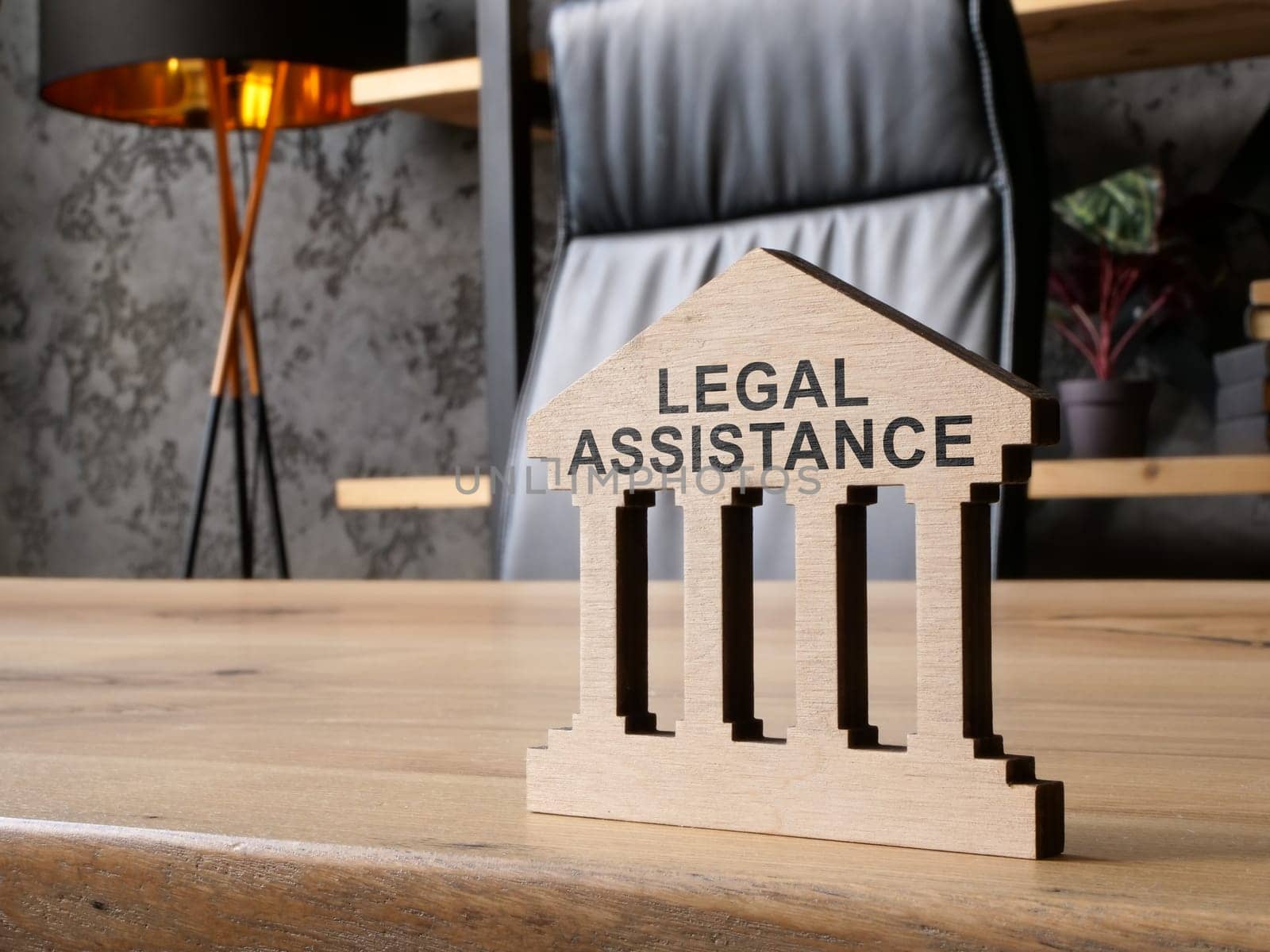 Legal assistance. The sign is on the table.