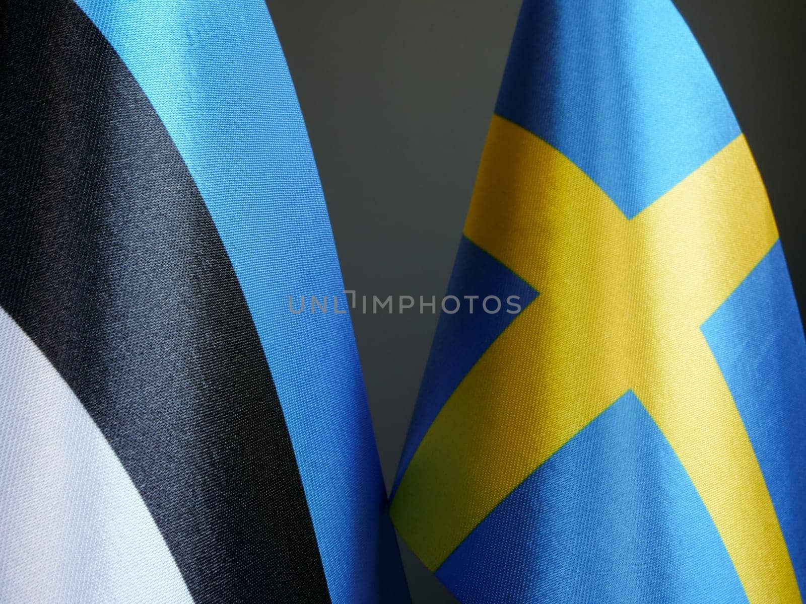 Close up Flags of Estonia and Sweden. by designer491
