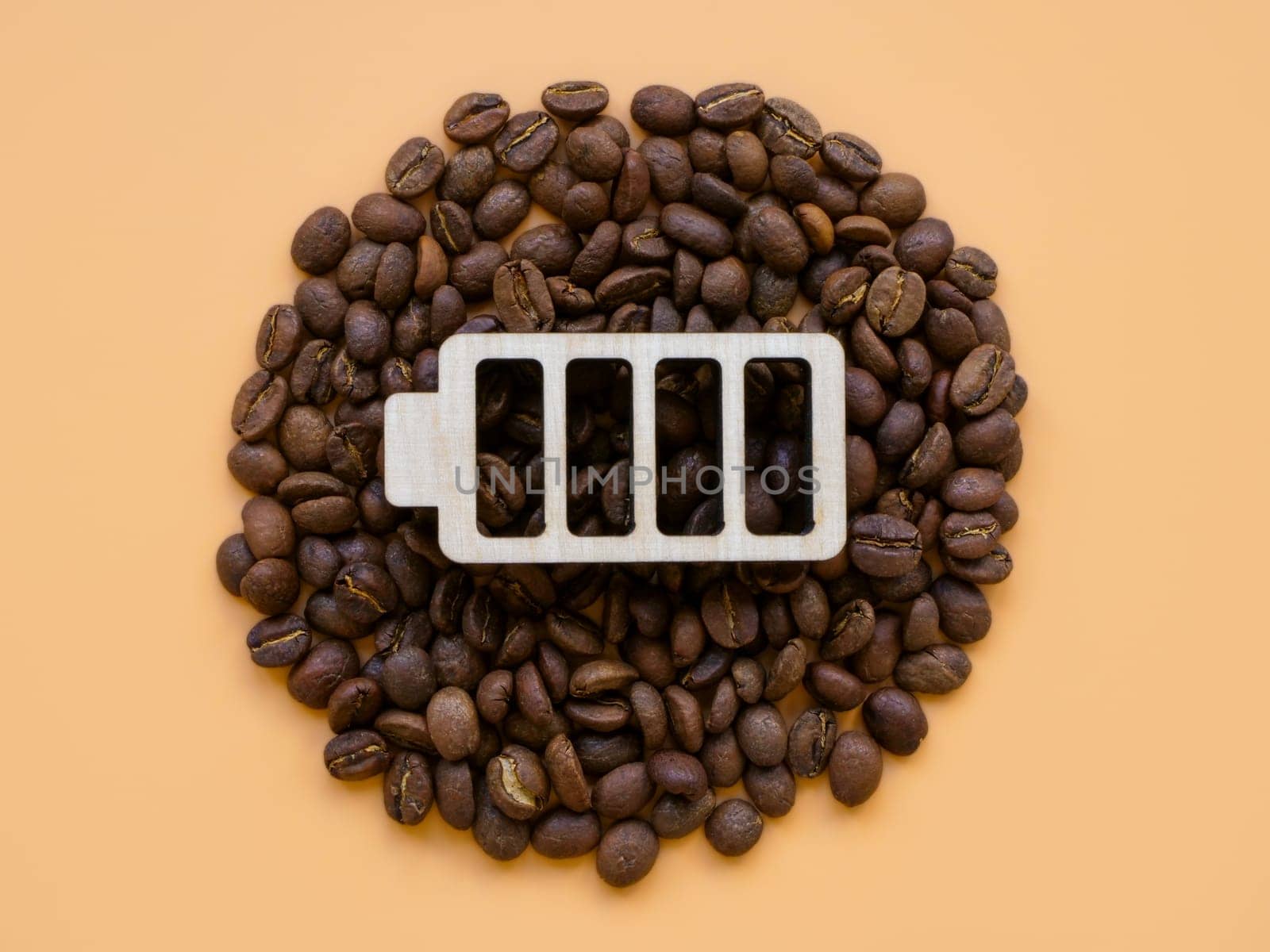 Coffee beans and battery symbol for cheerfulness and energy. Contemporary art.