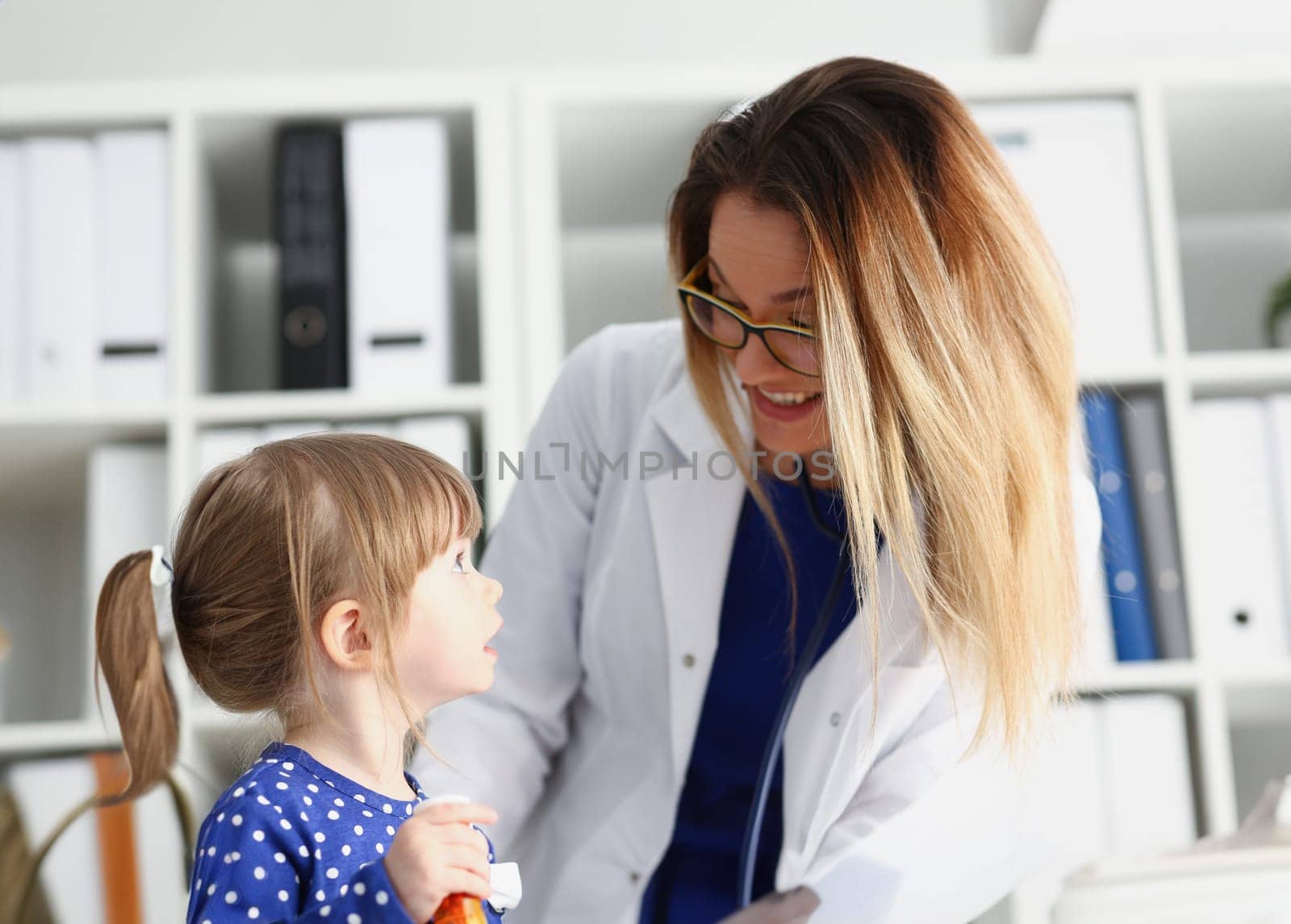 Little child with stethoscope at doctor reception. Physical exam cute infant portrait baby aid healthy lifestyle ward round child sickness specialist clinic test pulse concept