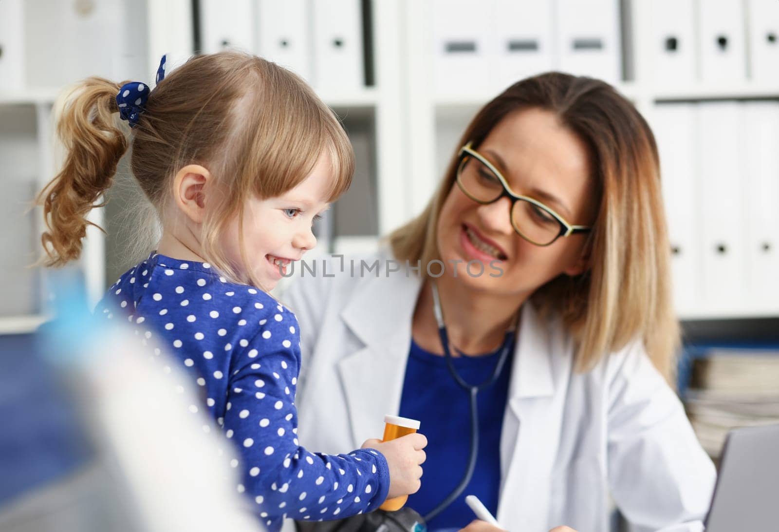 Little child with stethoscope at doctor reception. Physical exam cute infant portrait baby aid healthy lifestyle ward round child sickness specialist clinic test pulse concept
