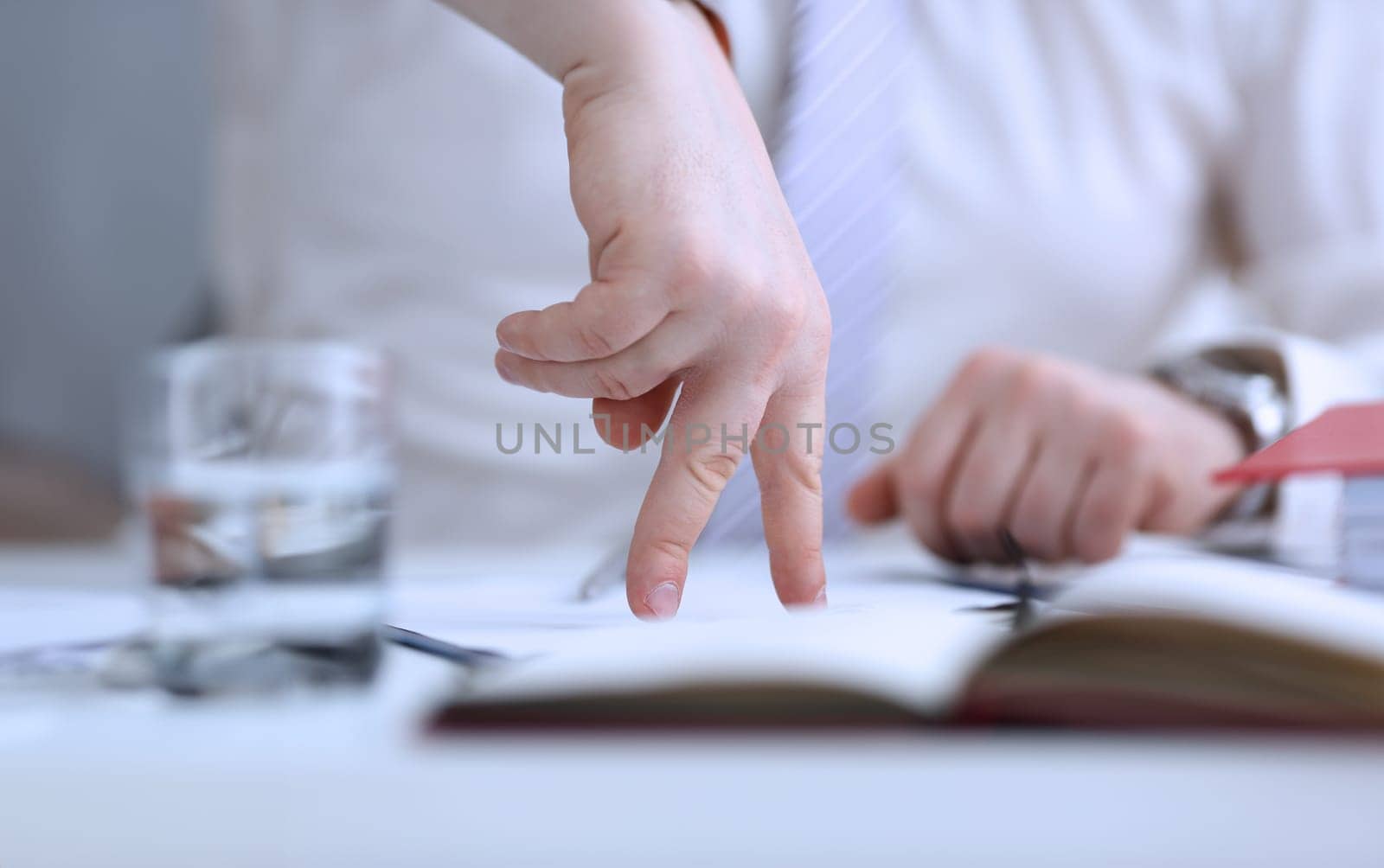 Male arms articulating during conference conversation in office closeup. Suggestion illustrate offer proposition bribe demand concept