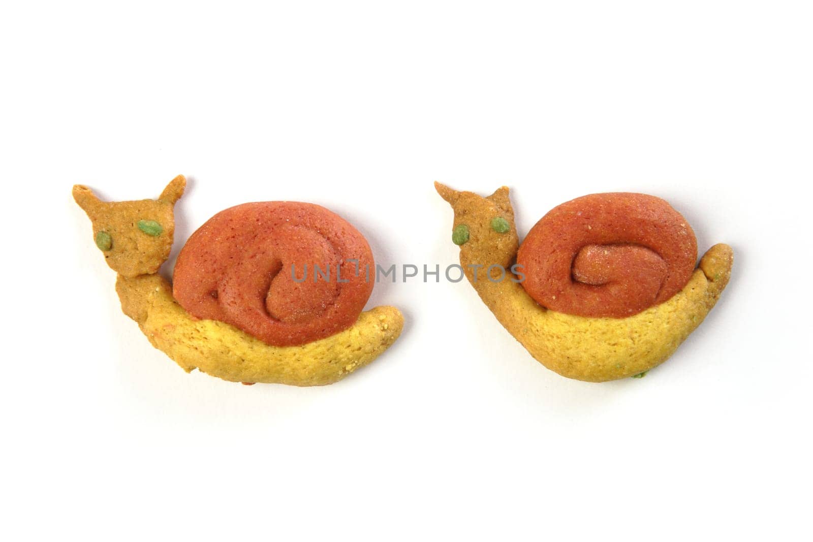 snail shapes yellow orange biscuits