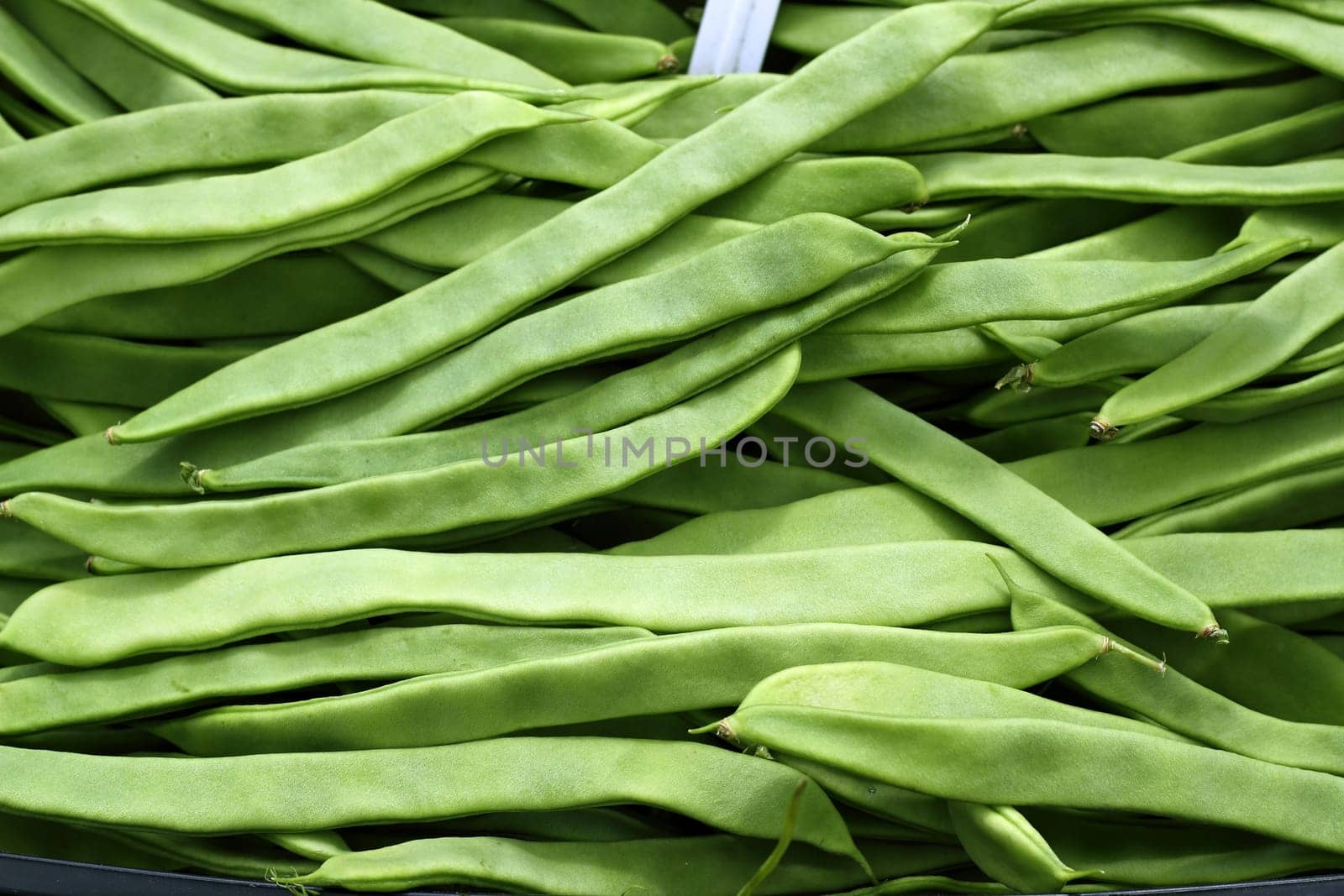 green beans vegetable texture in Spain market food background