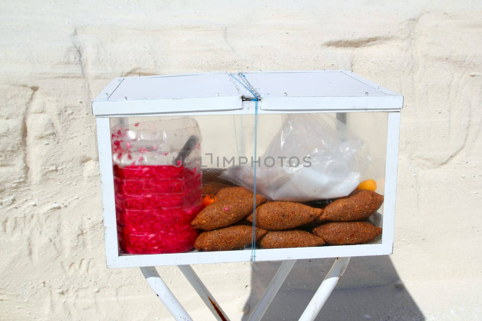 Kibis yucatecos mayan food from Mexico in portable glass box