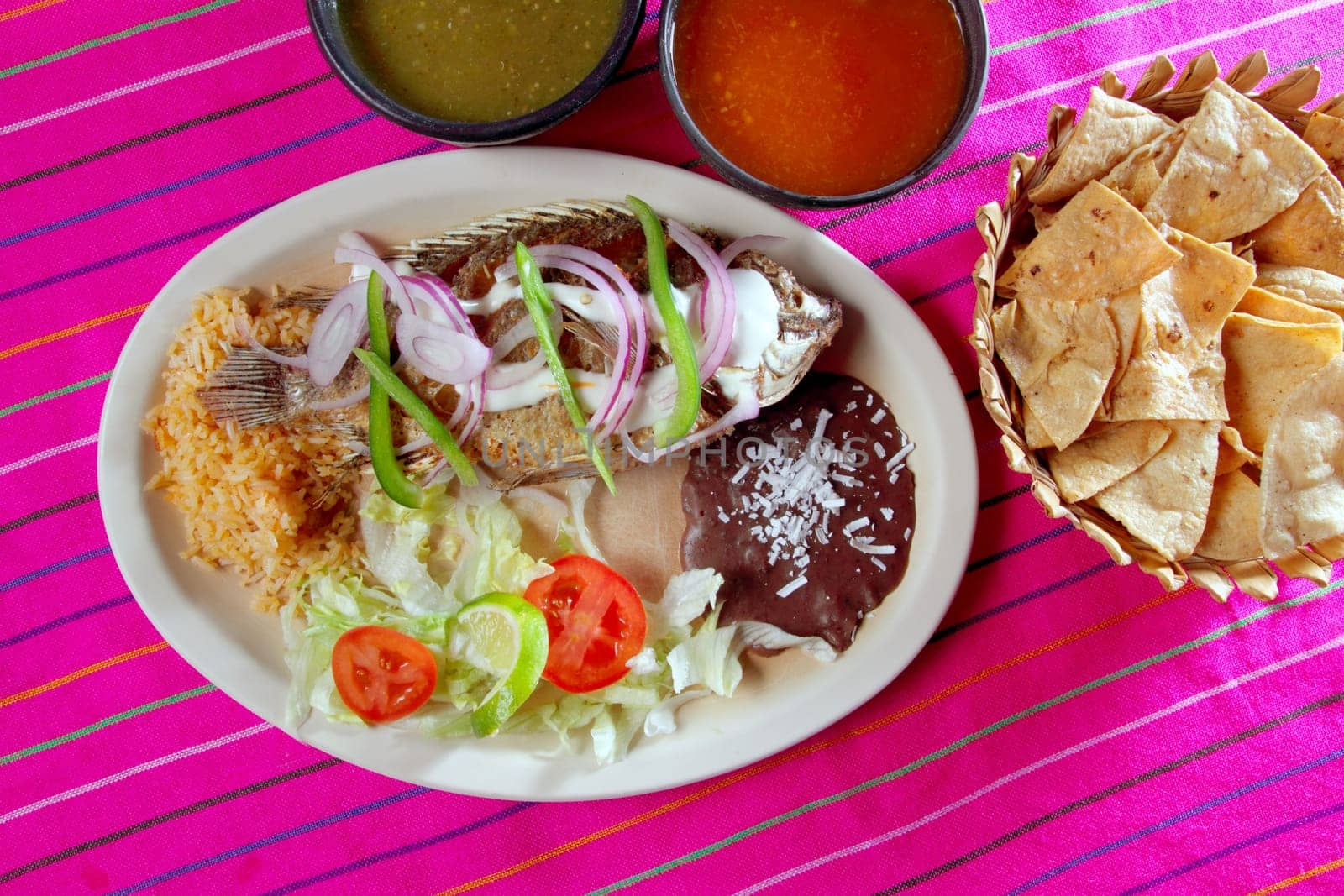 mojarra garlic mojo tilapia fish Mexico chili sauce and nachos