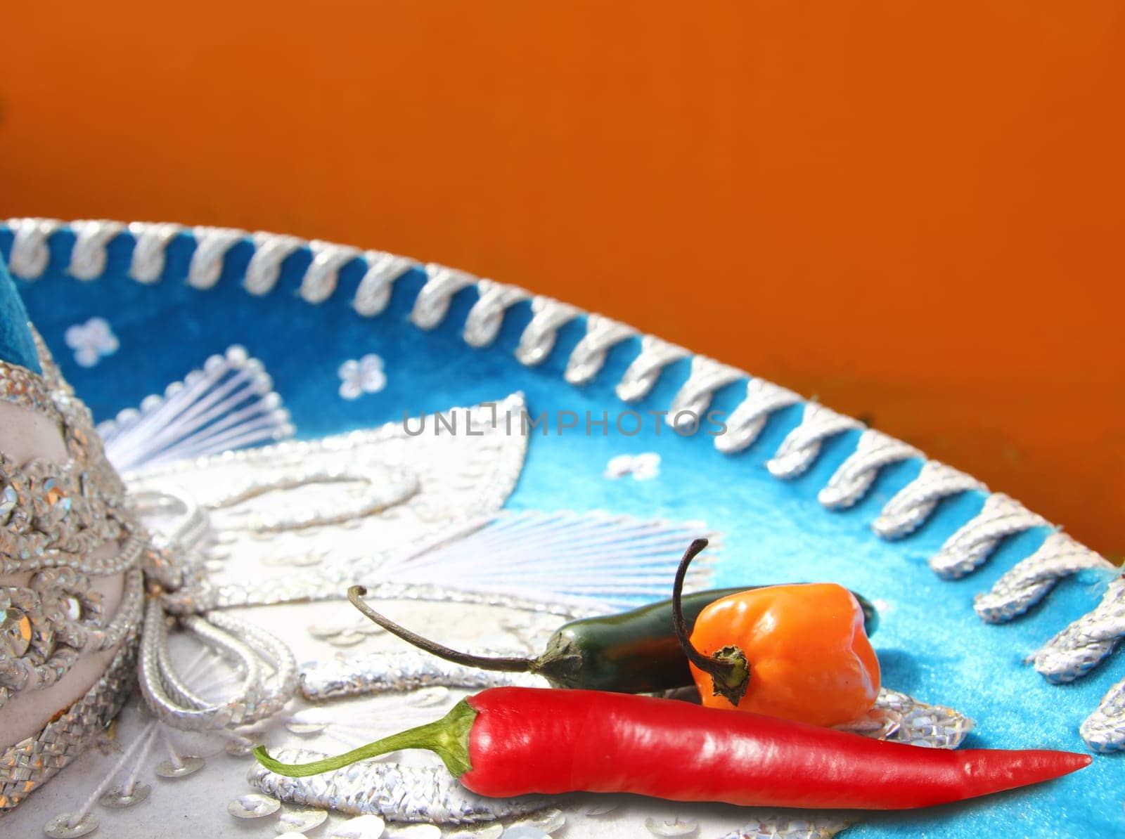 Mexican hot chili peppers in hat red habanero jalapeno serrano