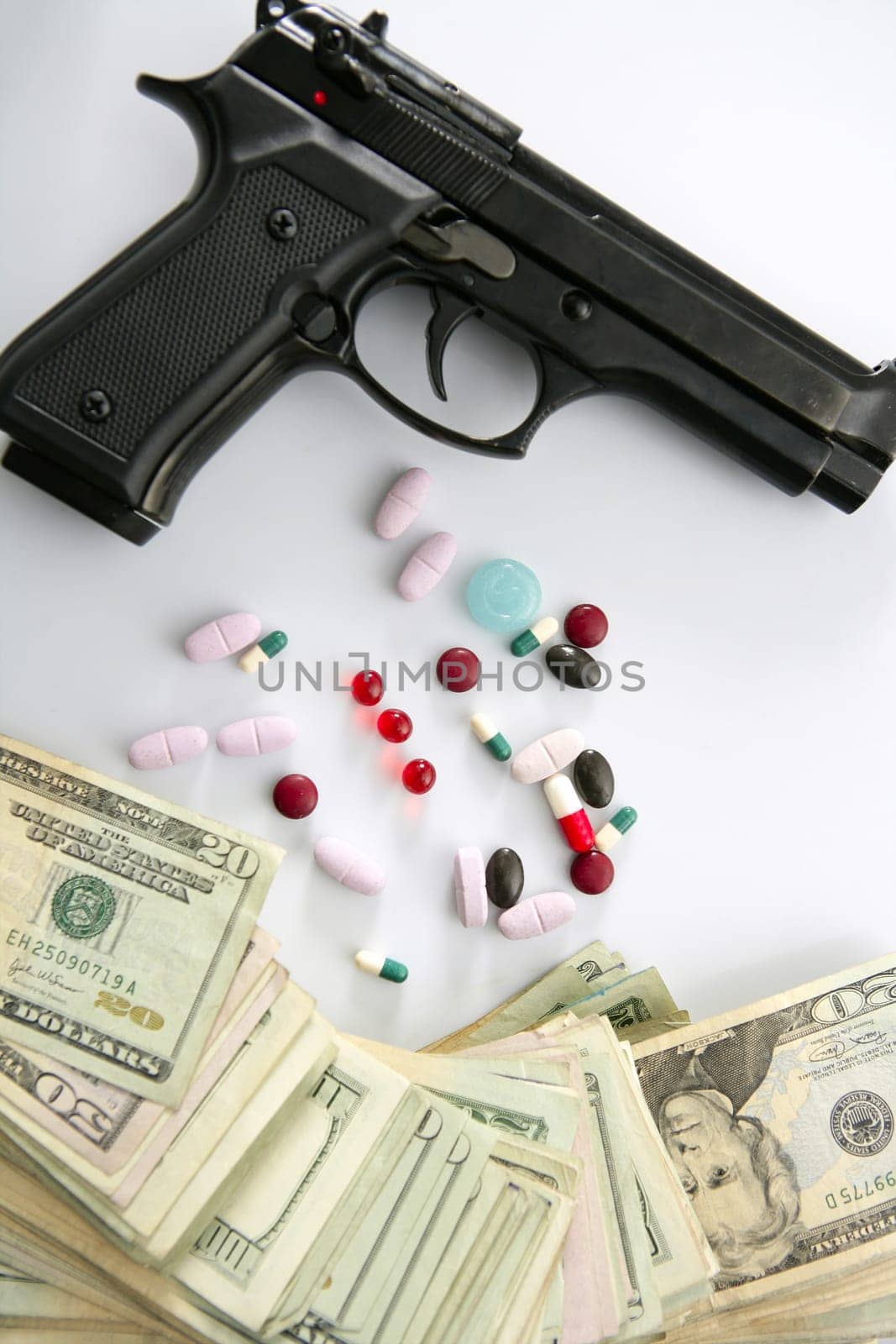 Dollar notes and gun, black pistol, mafia inspiration