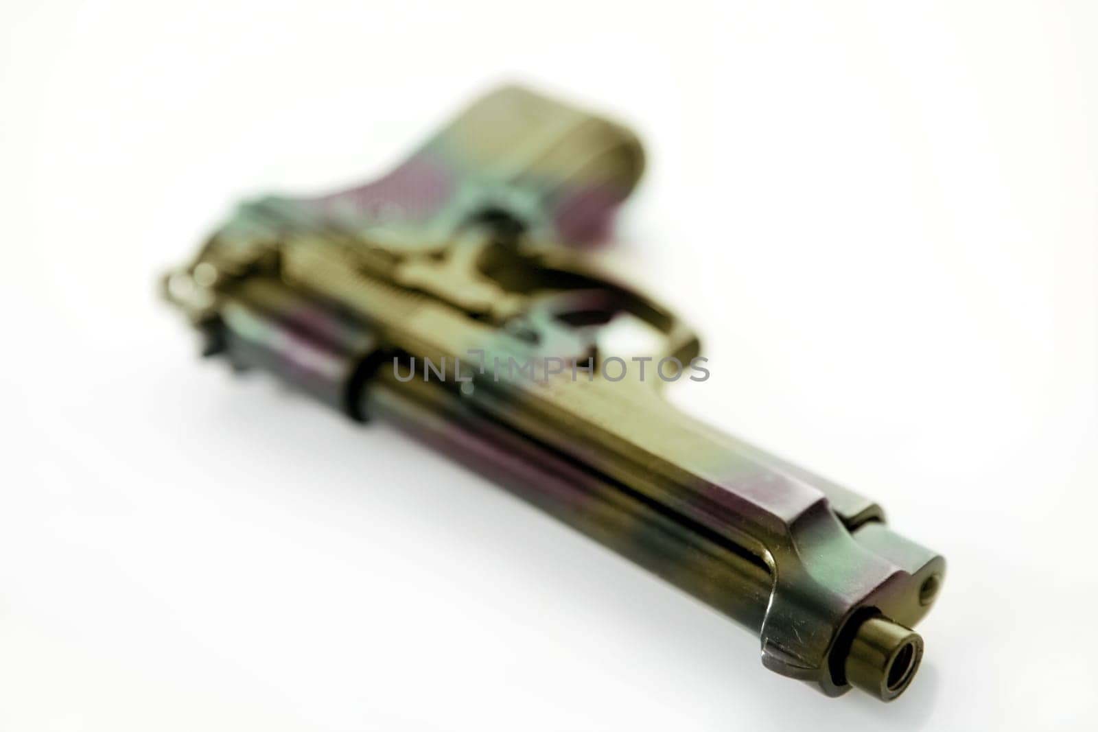 black hand gun pistol over white background, selective focus, studio shot