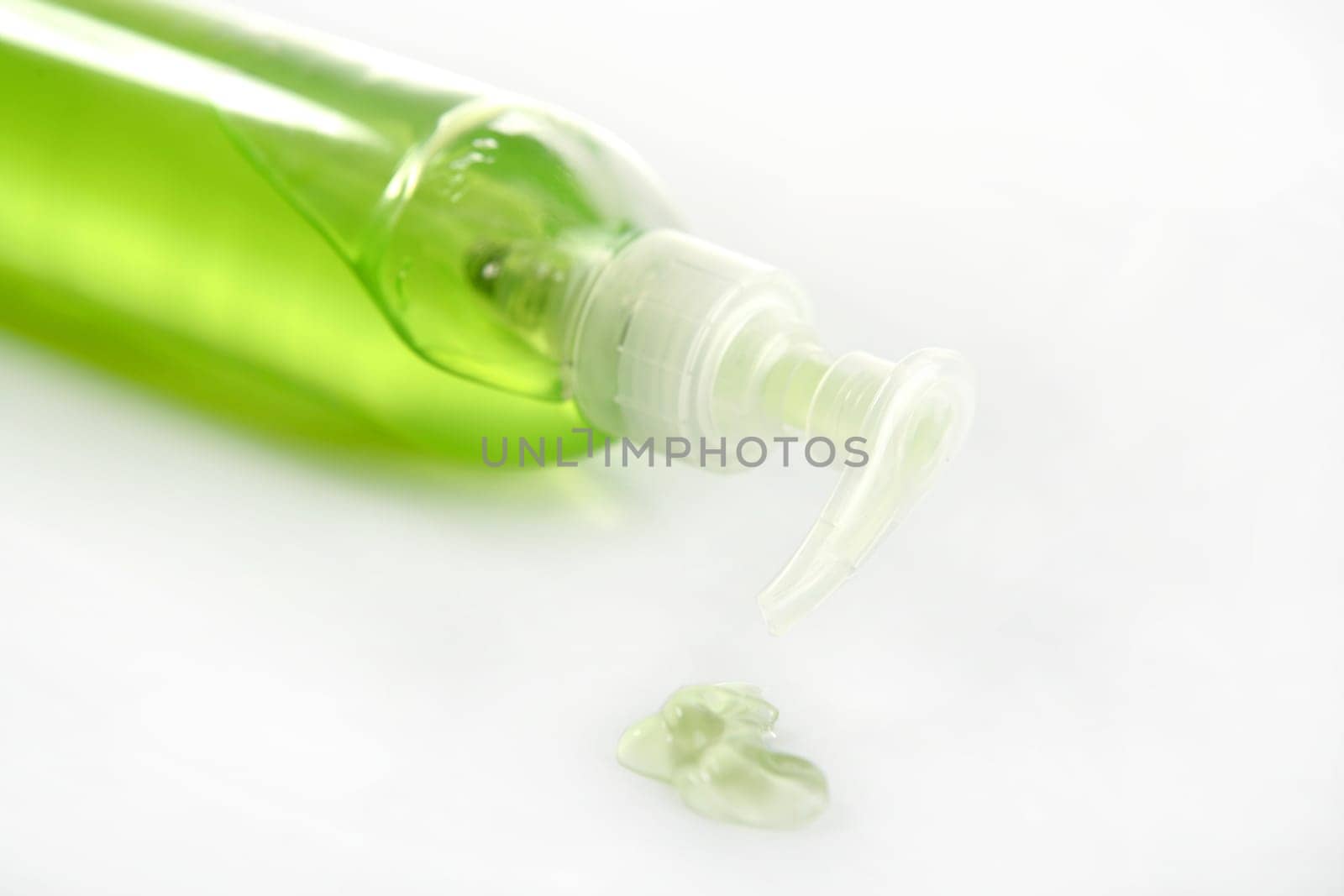 Aloe vera green gel transparent bottle, studio shot