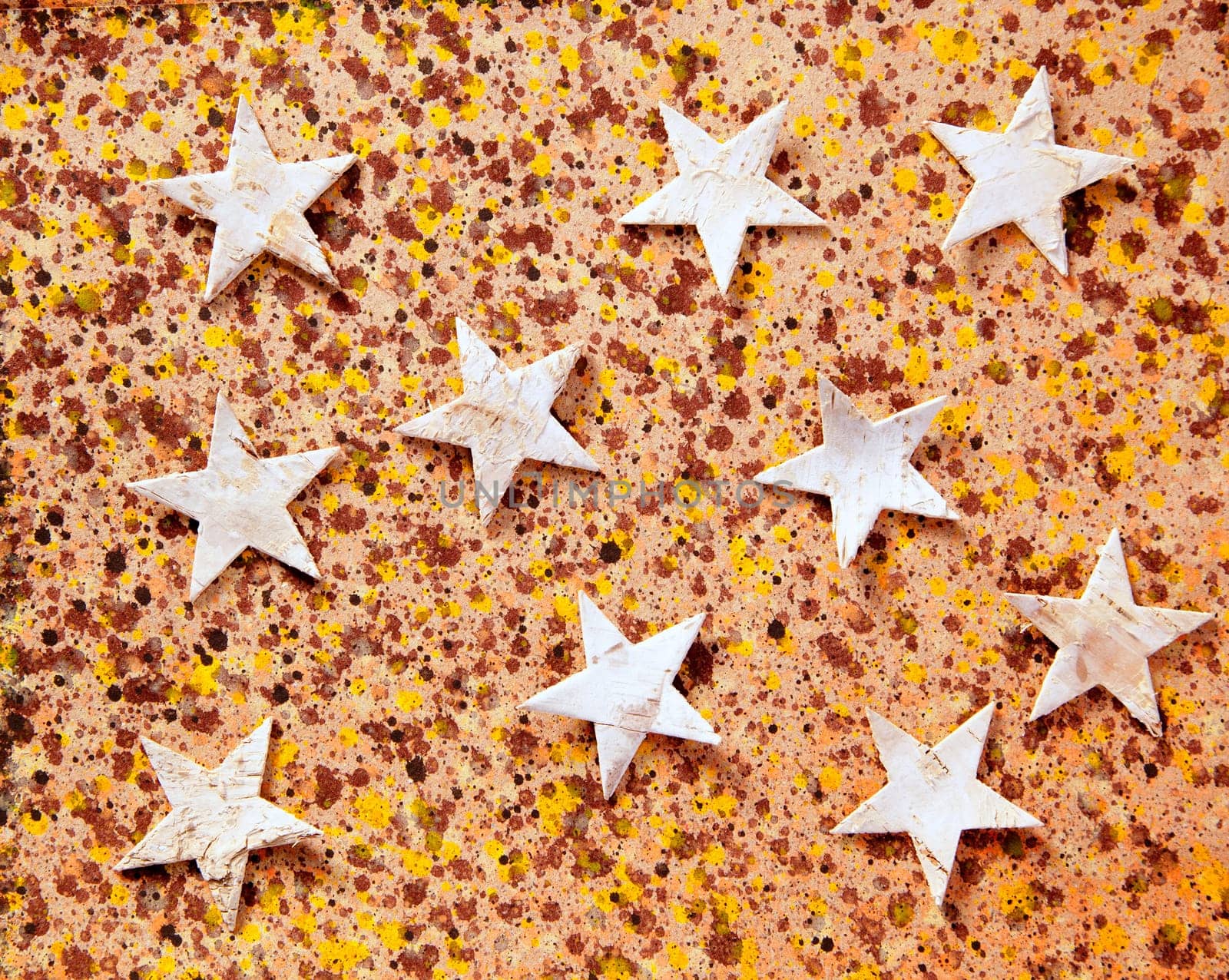 christmas stars background on recycled warm paper