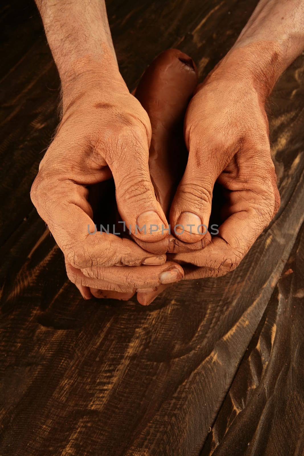 pottery craftmanship potter craftman hands working red clay