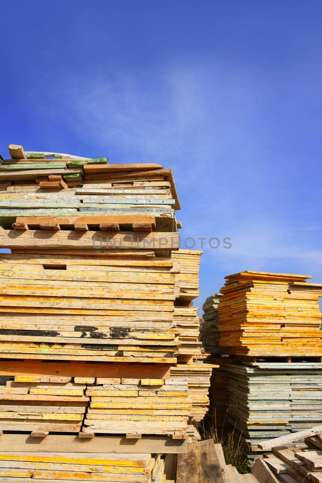 formwork shuttering wood board stacked blue sky