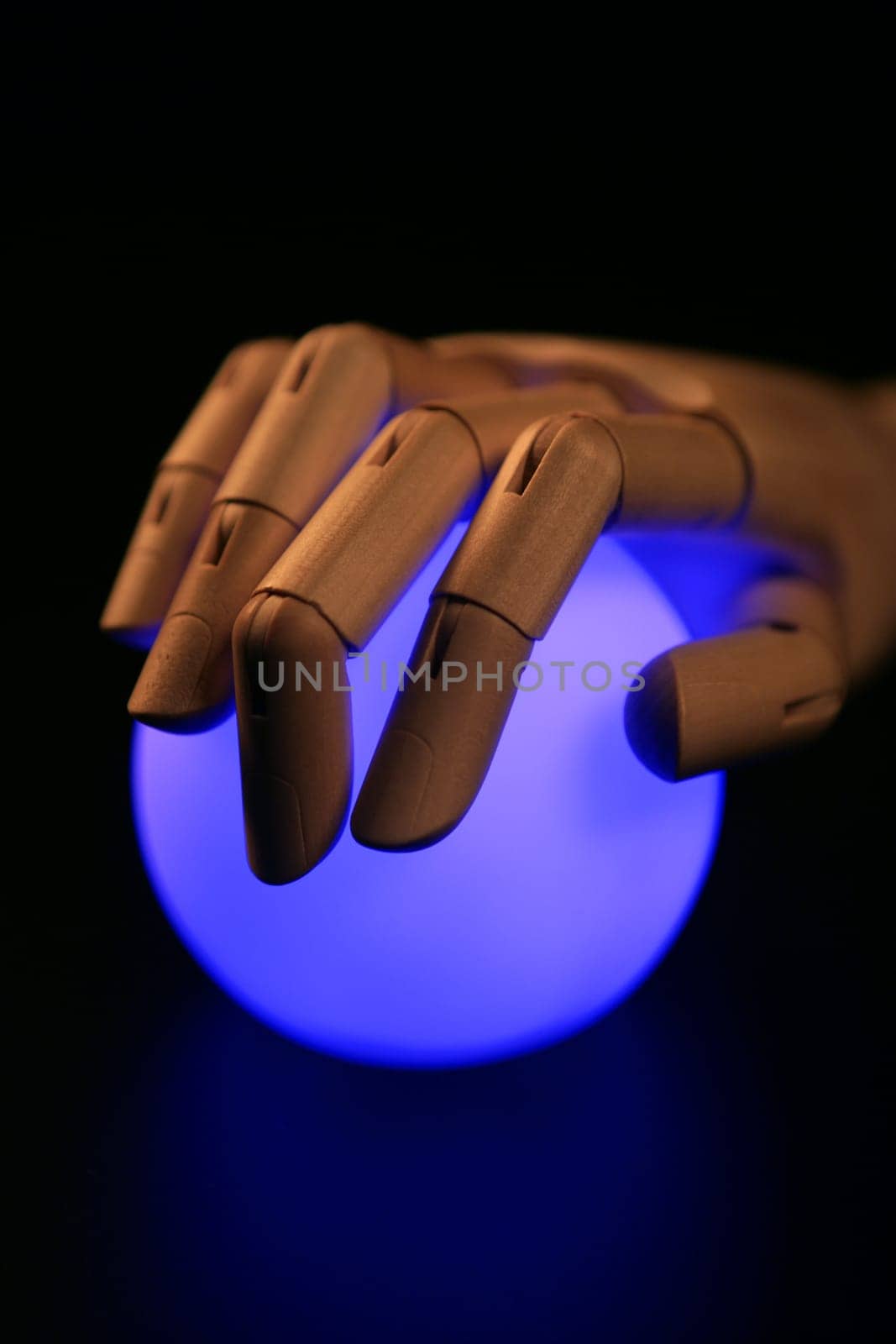 Wooden mannequin hand, ball of light, fortune teller, adivination