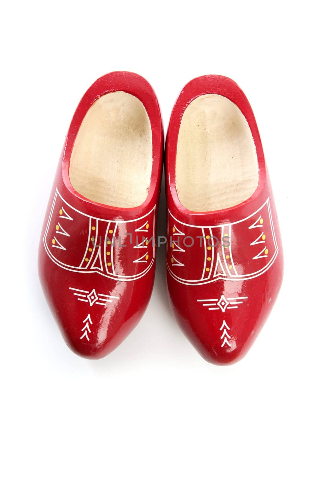 Dutch Holland red wooden shoes isolated on white studio background
