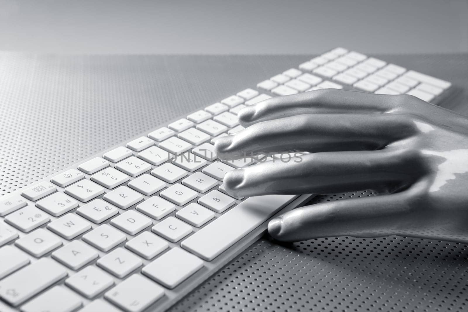 computer keyboard aluminum gray hand silver background