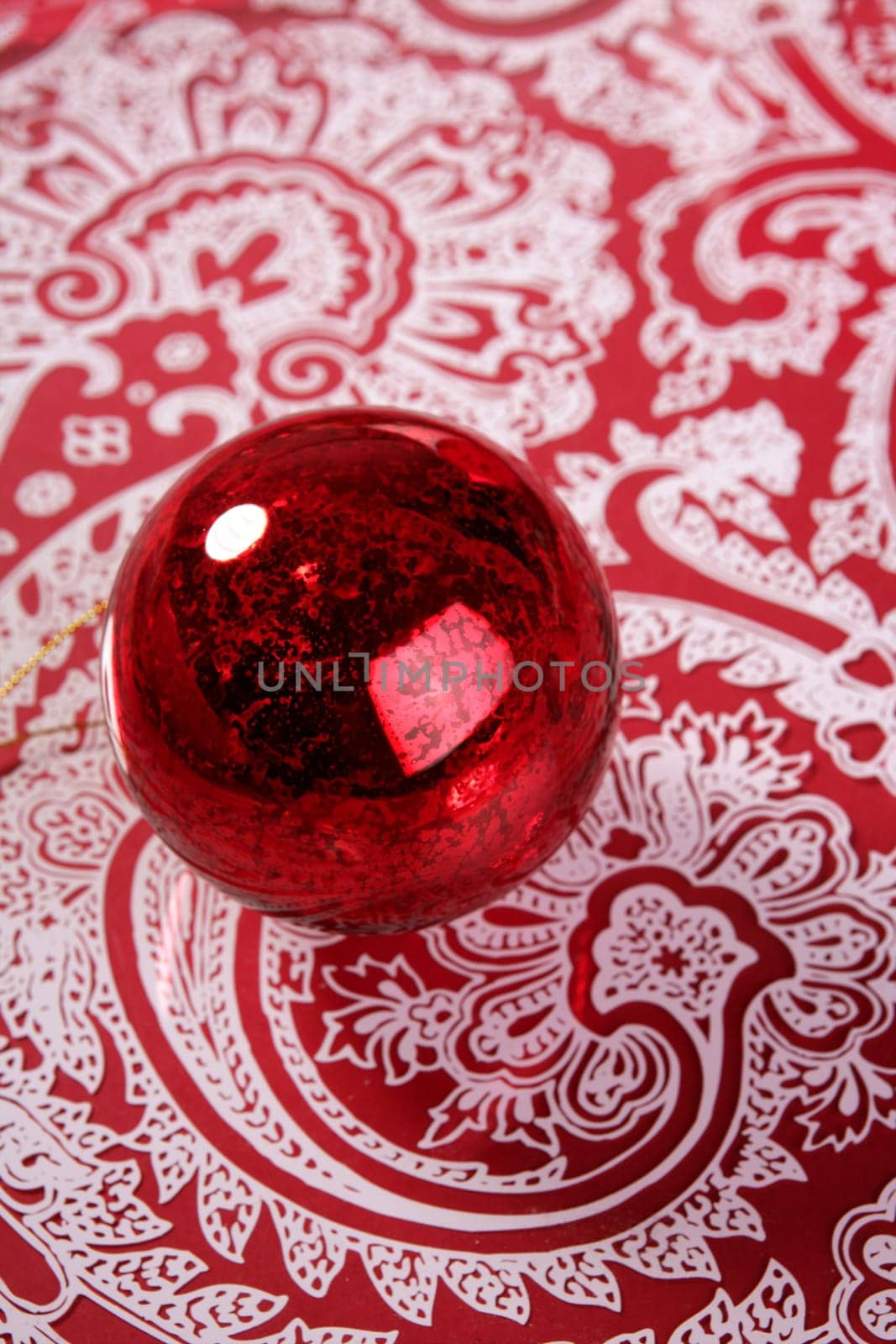Chrsitmas red ball over indian pattern background