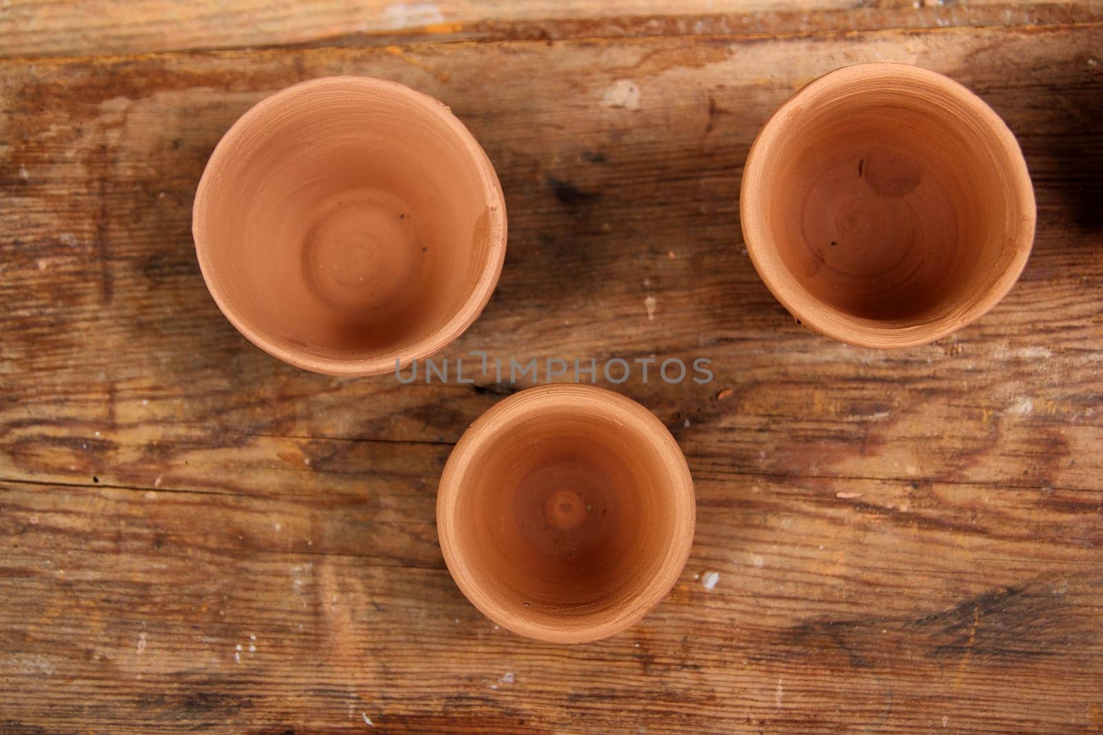 clay crafts pottery studio wood table traditional potter work warm color