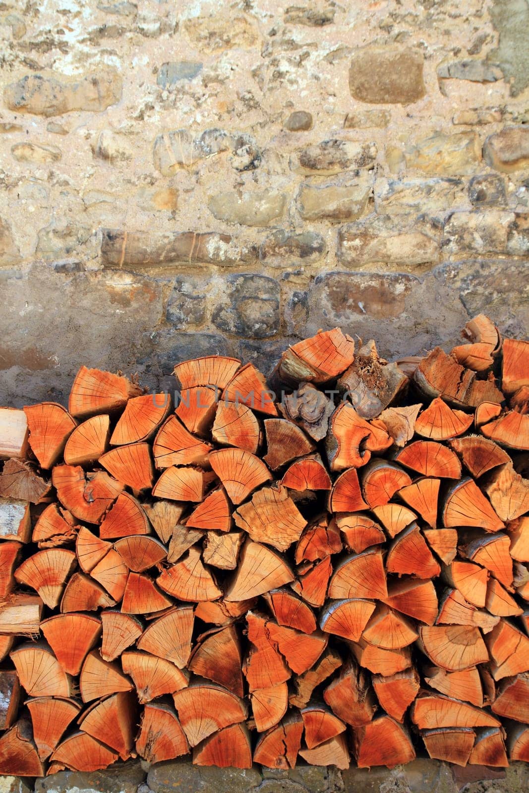 firewood wood pile stacked triangle shape red color