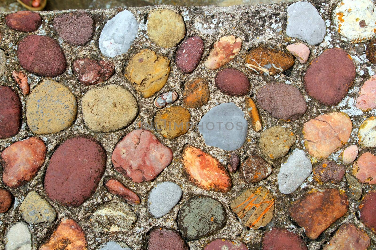 Rolling stones floor colorful pattern in Pyrenees Spain