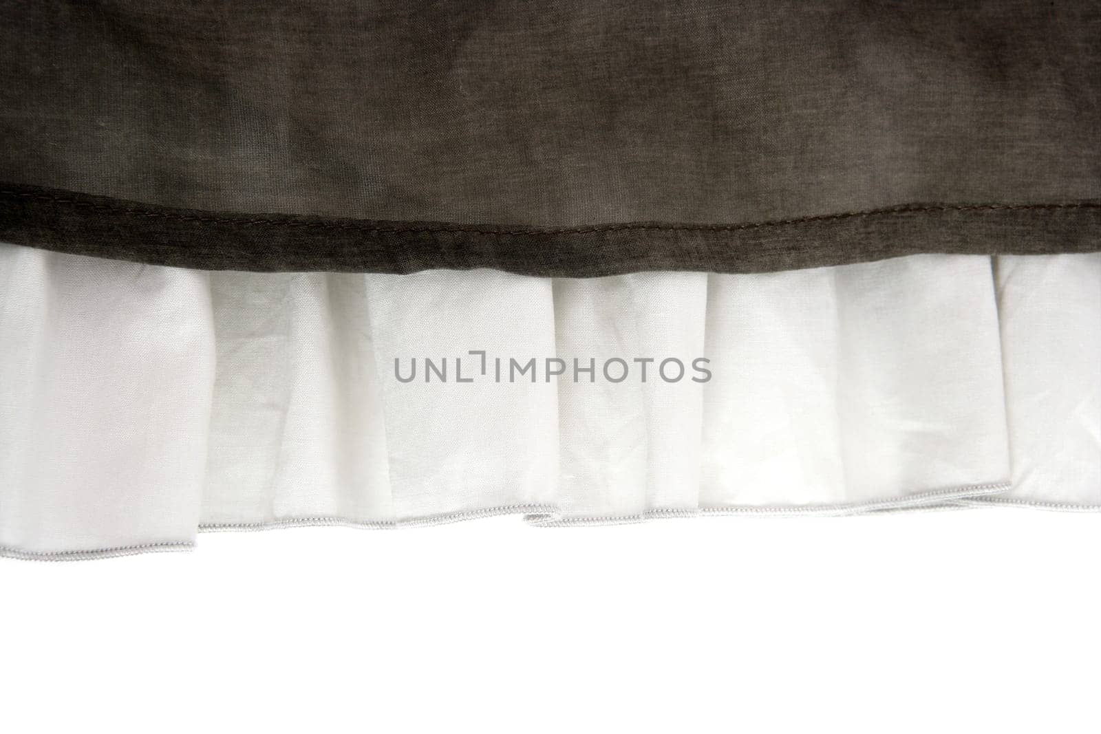 pleated skirt fabric fashion in white closeup detail