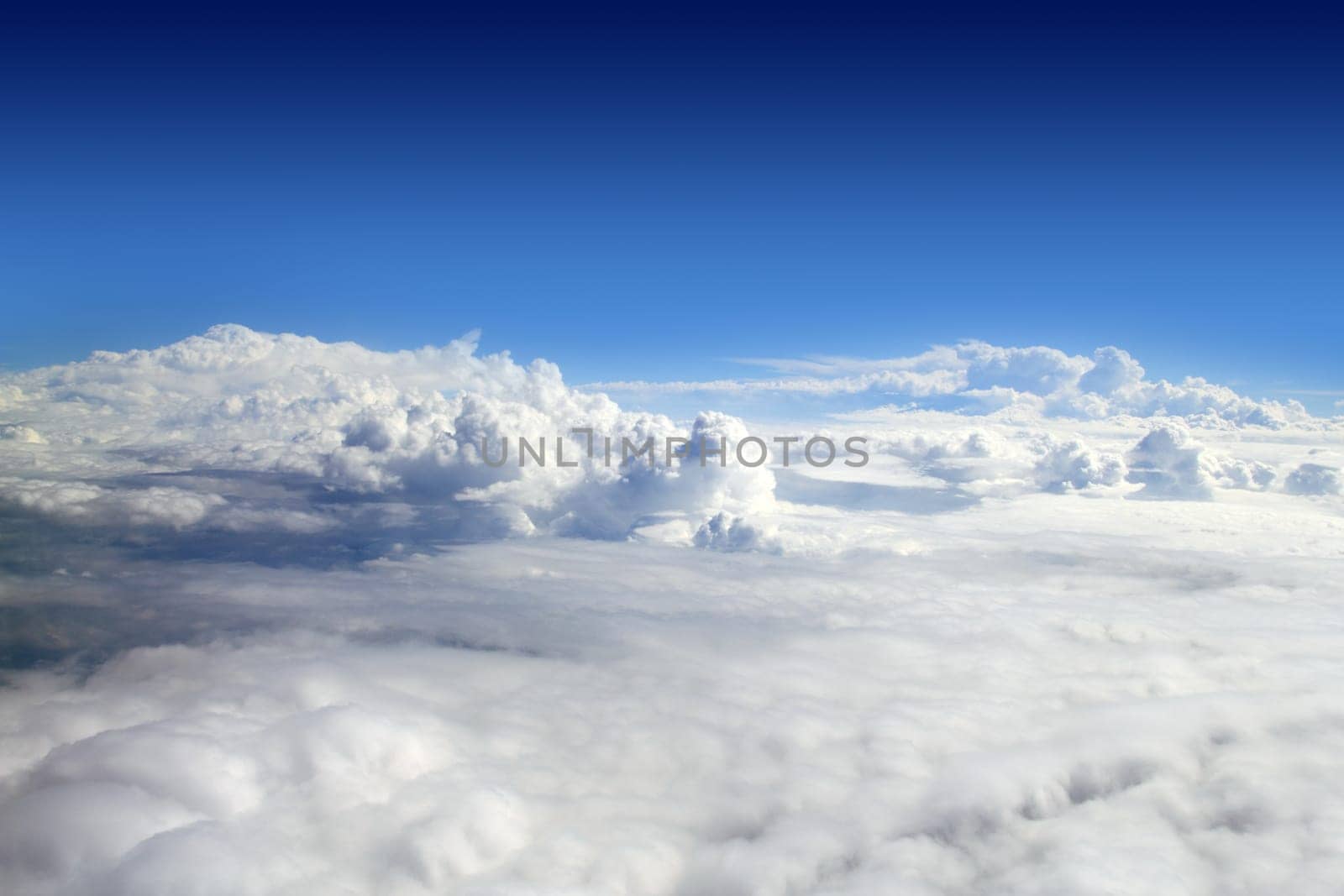 blue sky high view from airplane clouds shapes